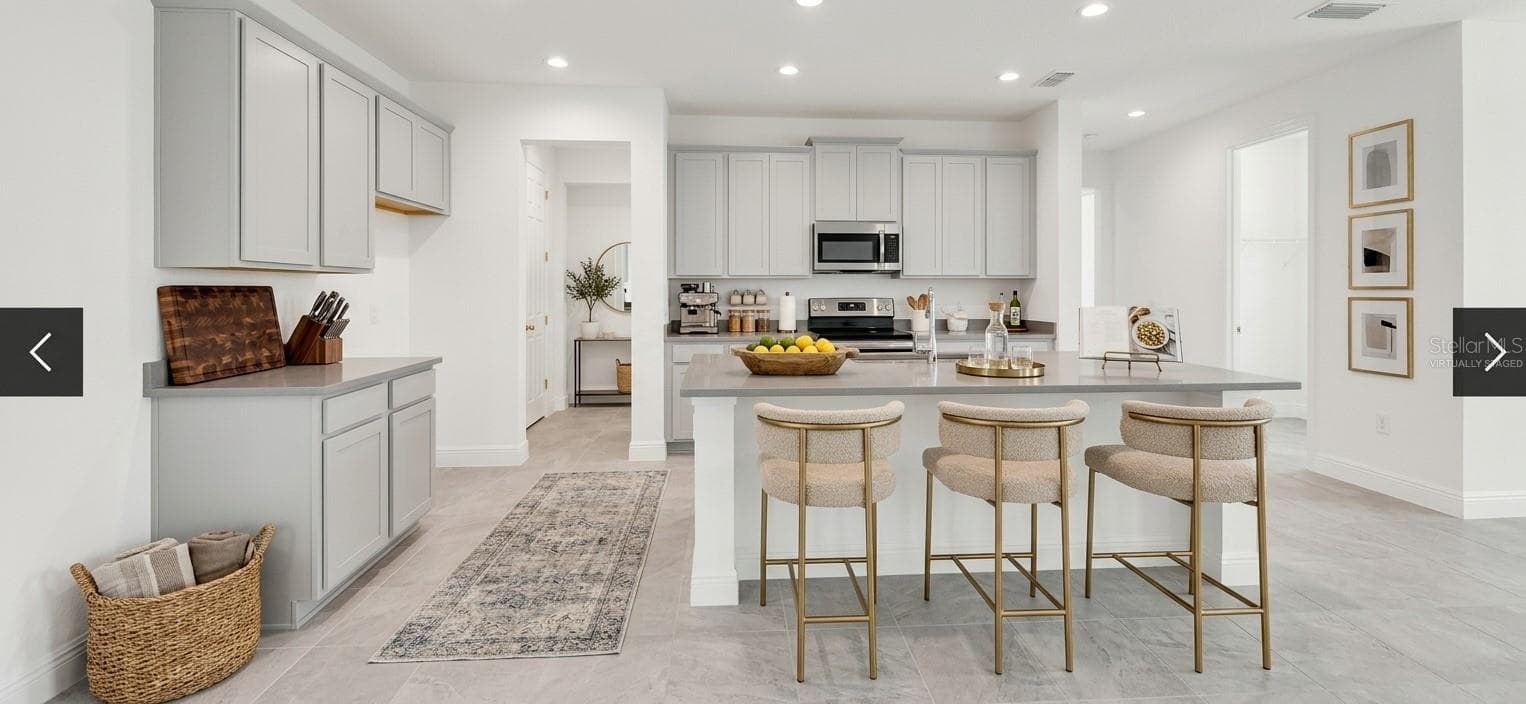 Virtually Staged Kitchen - 368 LEMONGRASS RD, MINNEOLA