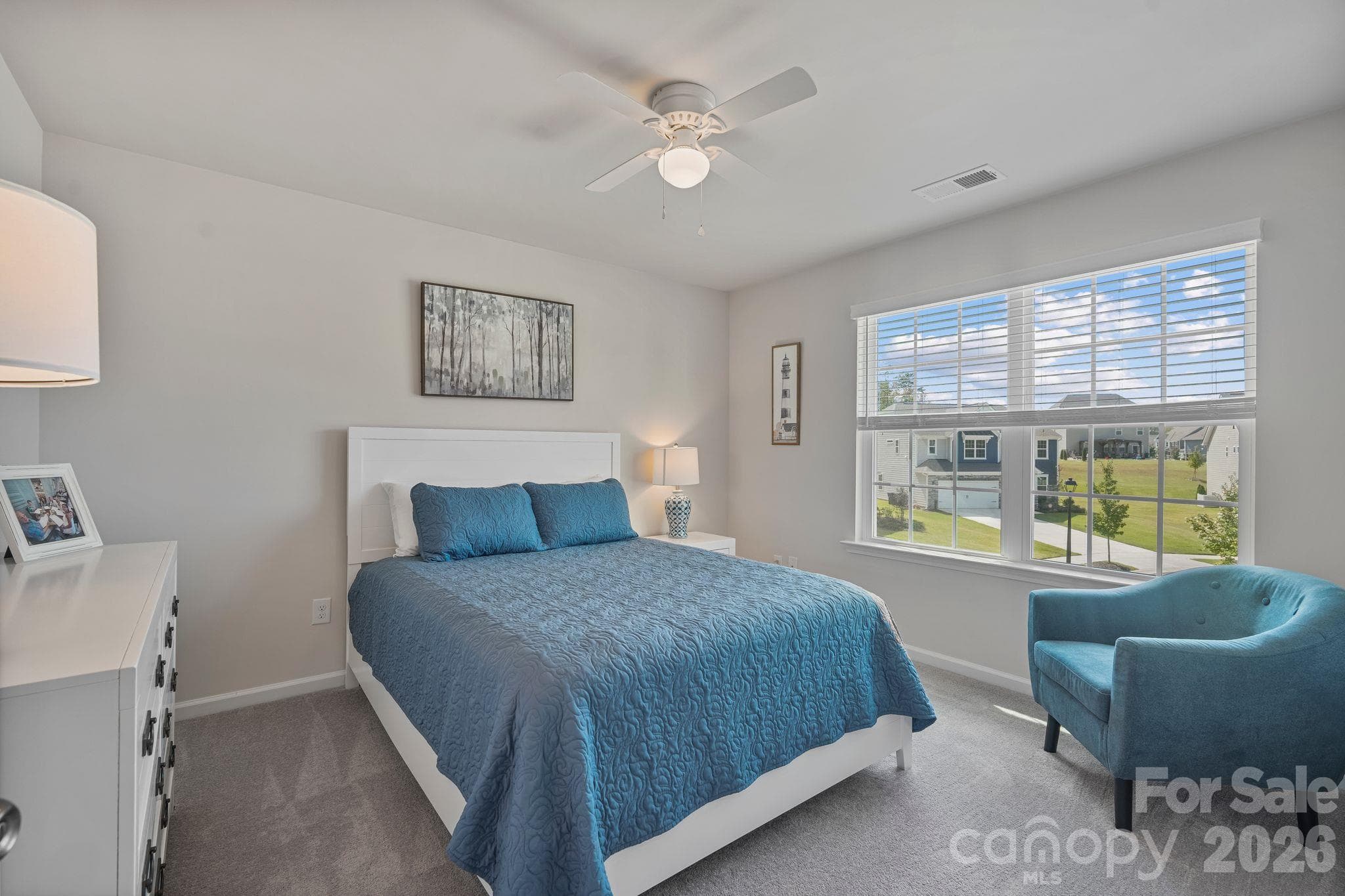 Fourth upstairs bedroom offering comfortable living space and convenient access to the shared full bathroom. - 107 Hollywood Court, Troutman