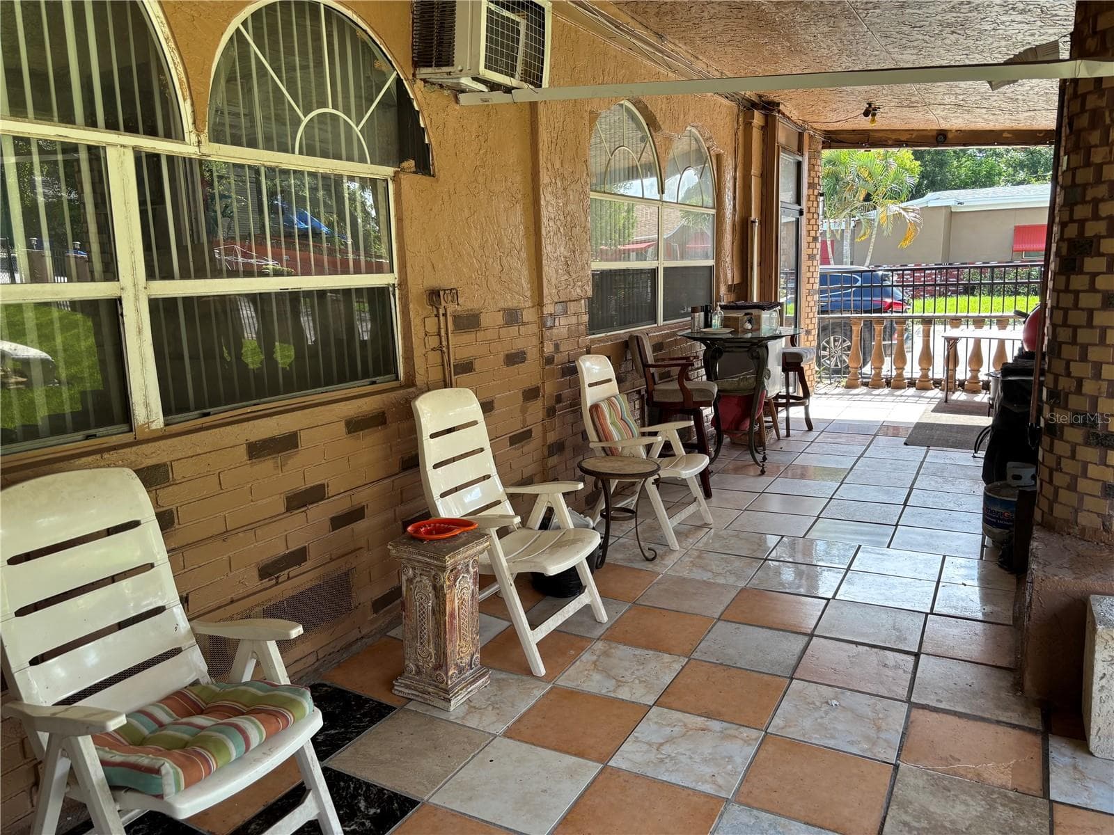 Side covered porch - 1747 YOUVAL CT S, ST PETERSBURG