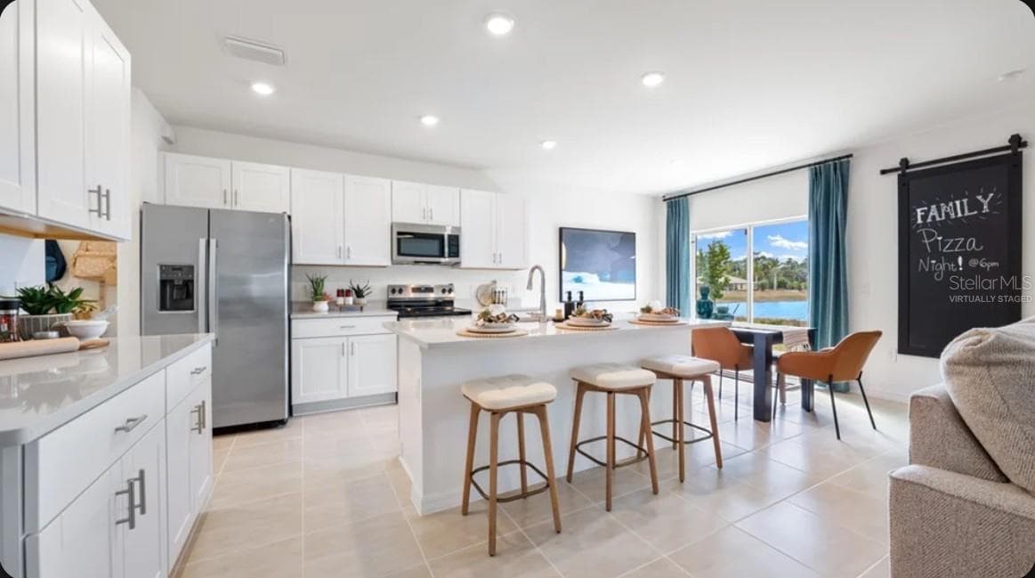 Virtually Staged Representative Photo - 5351 LOGGIA LN, KISSIMMEE