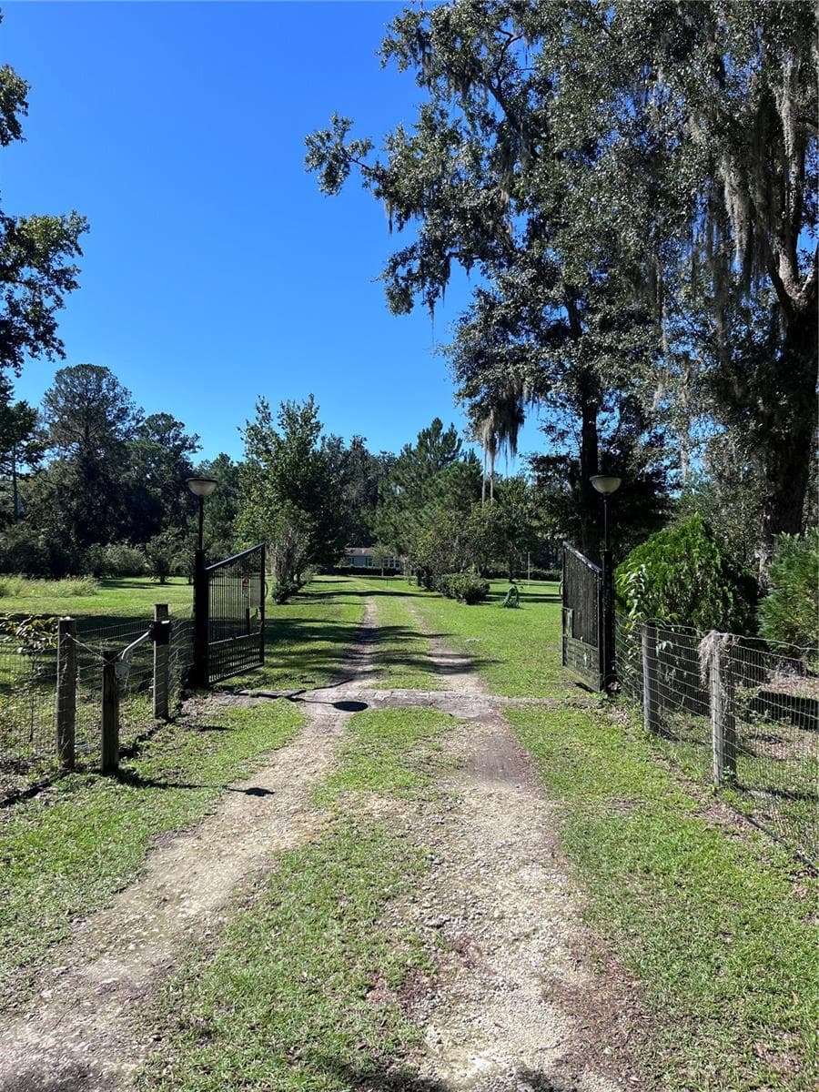 Manufactured Home at 21330 NW 106TH COURT RD, MICANOPY, photo 3 of 53