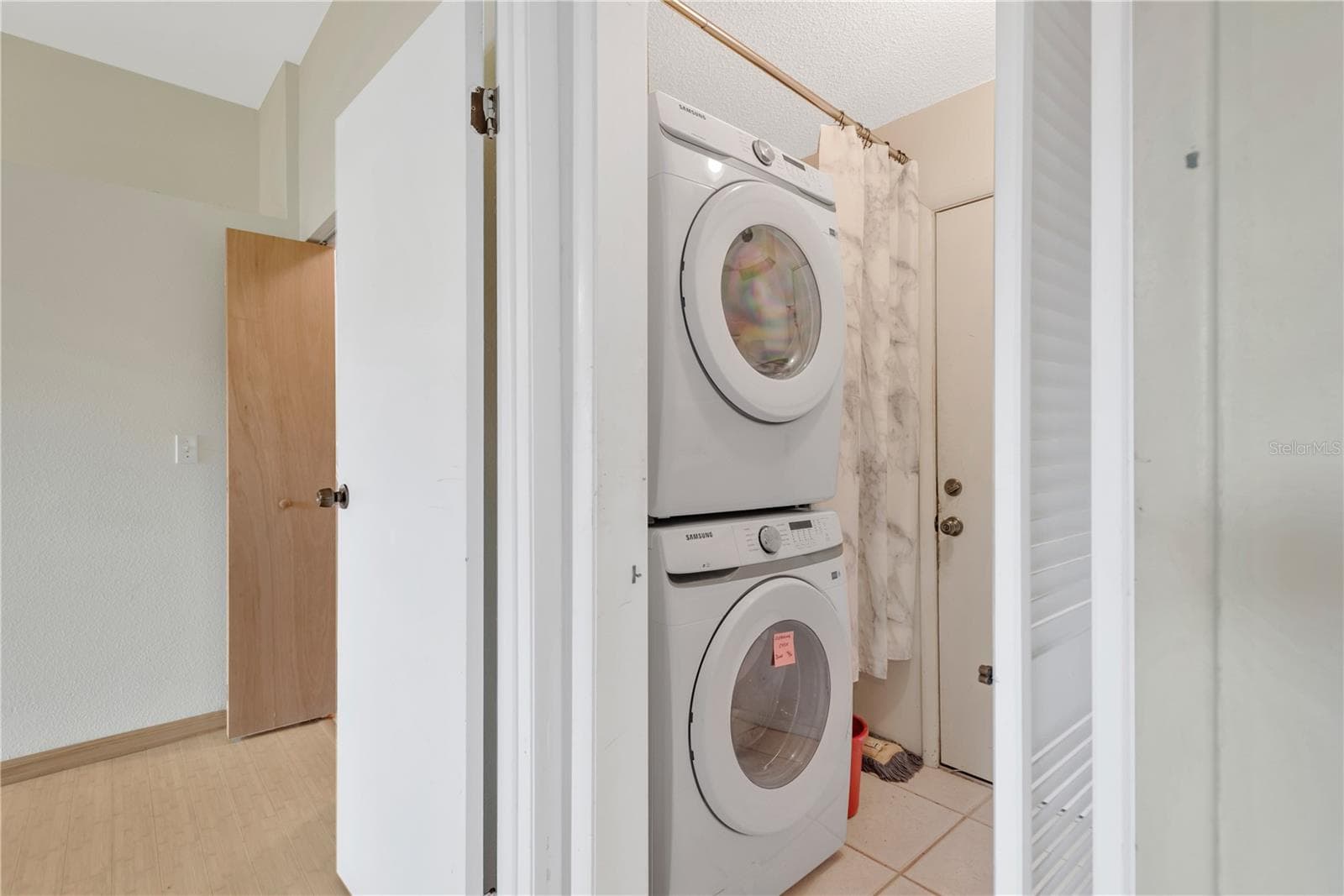 Inside Laundry/Mud Room with door into 2 Car Garage. - 5546 34TH CT E, BRADENTON