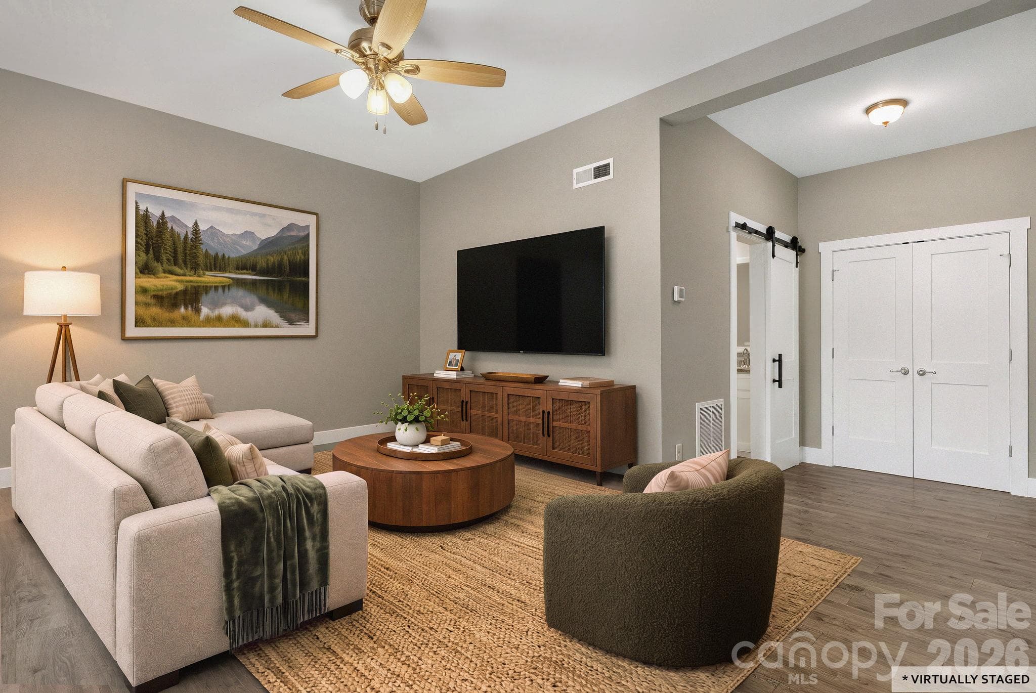 Lower level virtually staged to show Living area - 133 Asher Lane, Etowah