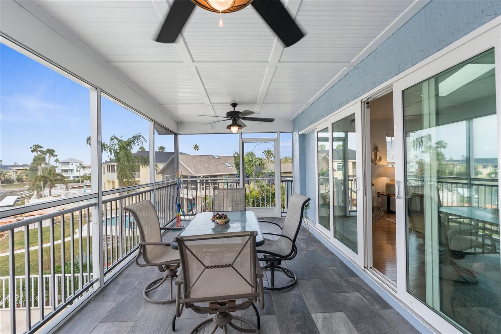 Back exposure deck off living room (screened). Located on second story. - 6029 BAYWAY CT, NEW PORT RICHEY