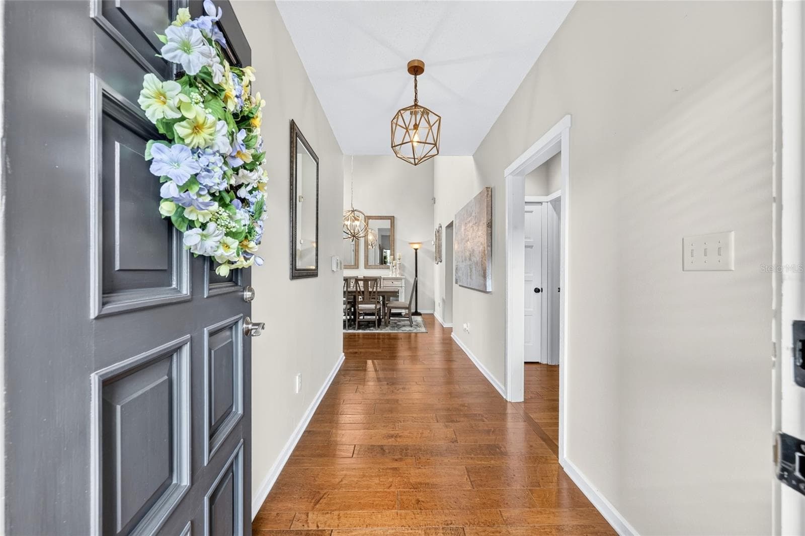 Through the front door into the foyer - 1731 SE CLATTER BRIDGE RD, OCALA