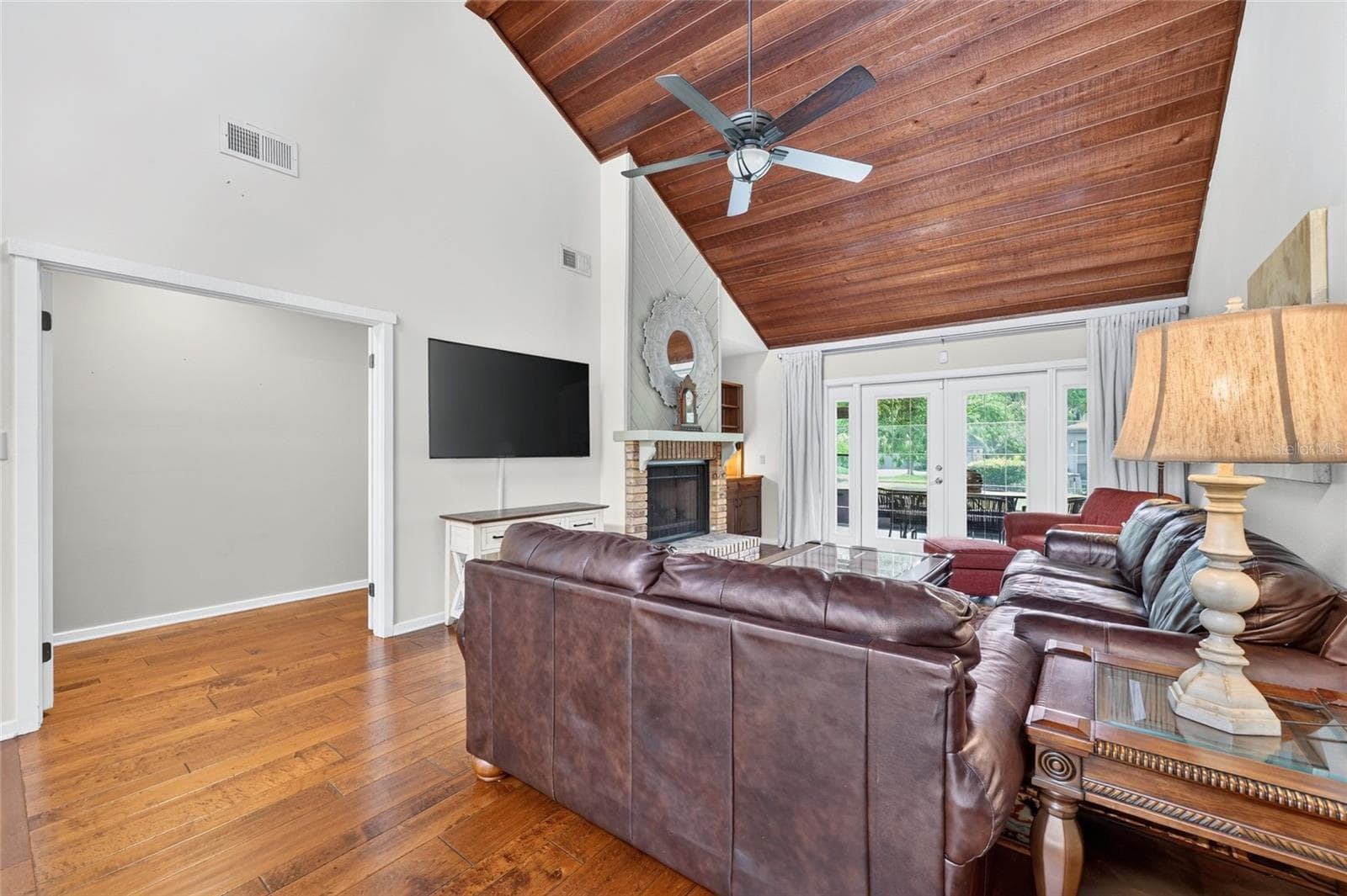 Living Room into Primary Suite - 1731 SE CLATTER BRIDGE RD, OCALA