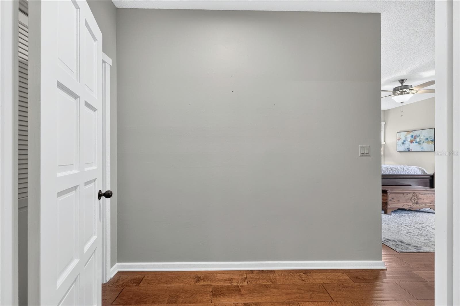 Door off of Living Room into the Primary Suite - 1731 SE CLATTER BRIDGE RD, OCALA