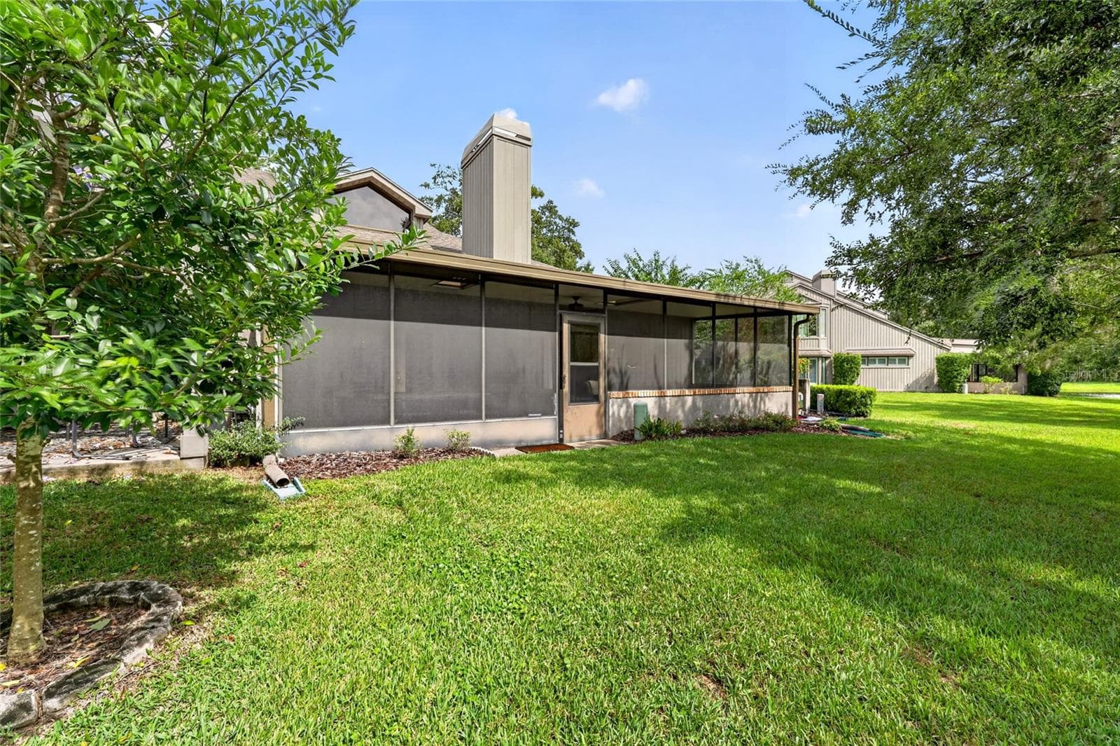 Screened Back Porch - 1731 SE CLATTER BRIDGE RD, OCALA