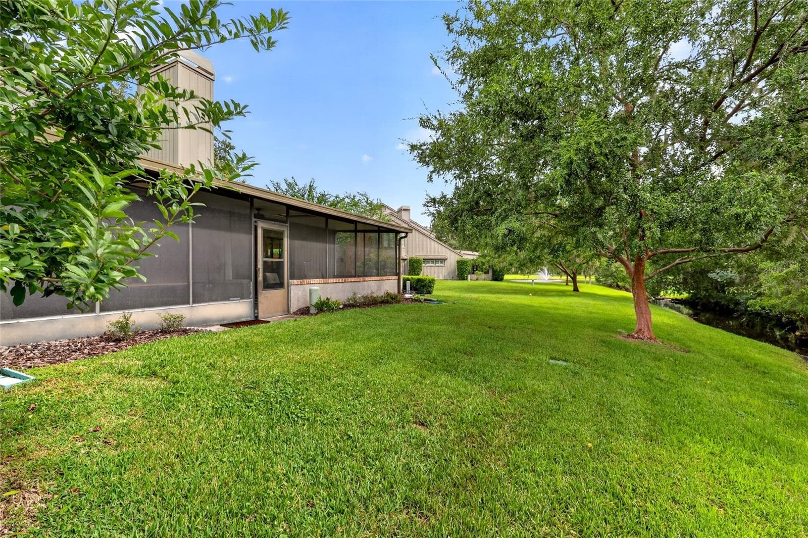 Screened Back Porch - 1731 SE CLATTER BRIDGE RD, OCALA