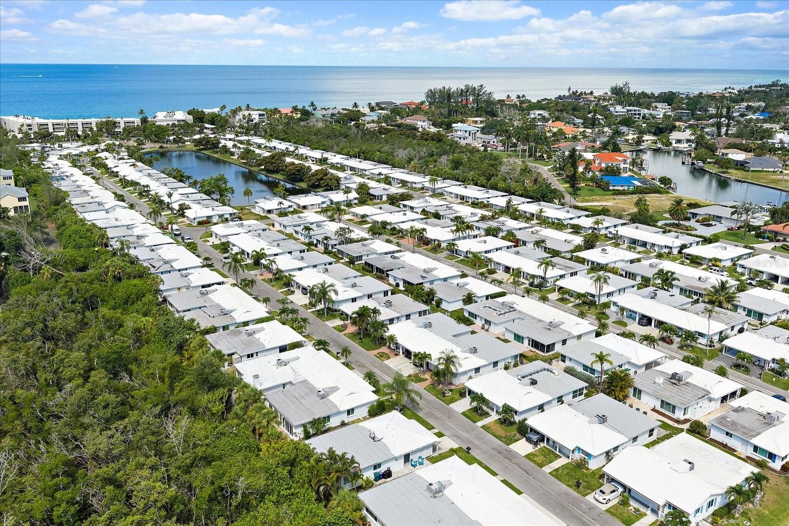 Aerial view of waterfront condo community - 738 SPANISH DR S #98, LONGBOAT KEY