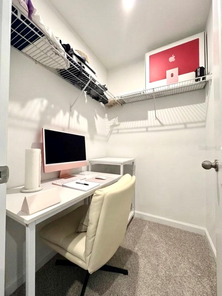One of Master bedroom closet - 1123 BOARDWALK PL, KISSIMMEE