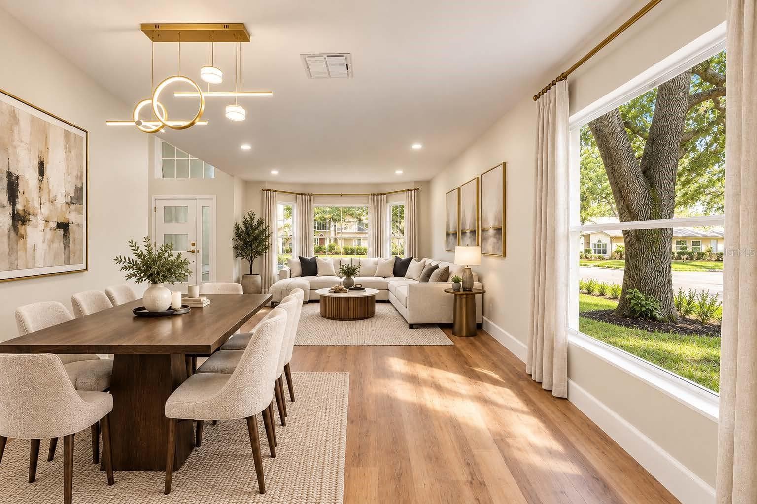 Staged to show Dining/ Living combo set up - 13044 BELLERIVE LN, ORLANDO