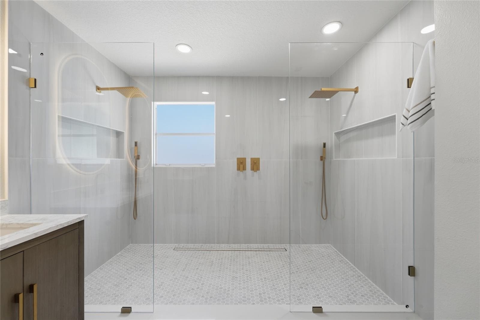 Oversized walk-in shower with largeporcelain tile and dual rainfall heads - 13044 BELLERIVE LN, ORLANDO