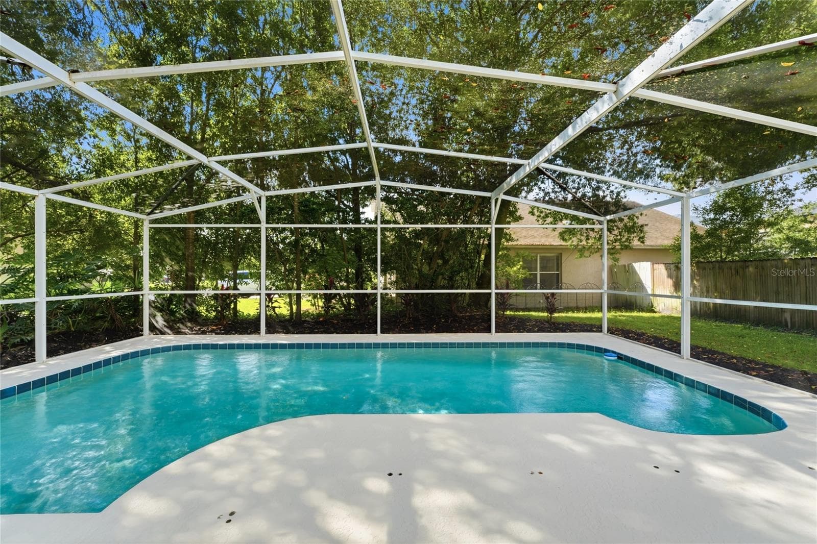 Pool includes a removable child safety net that is currently stored in the garage - 13044 BELLERIVE LN, ORLANDO