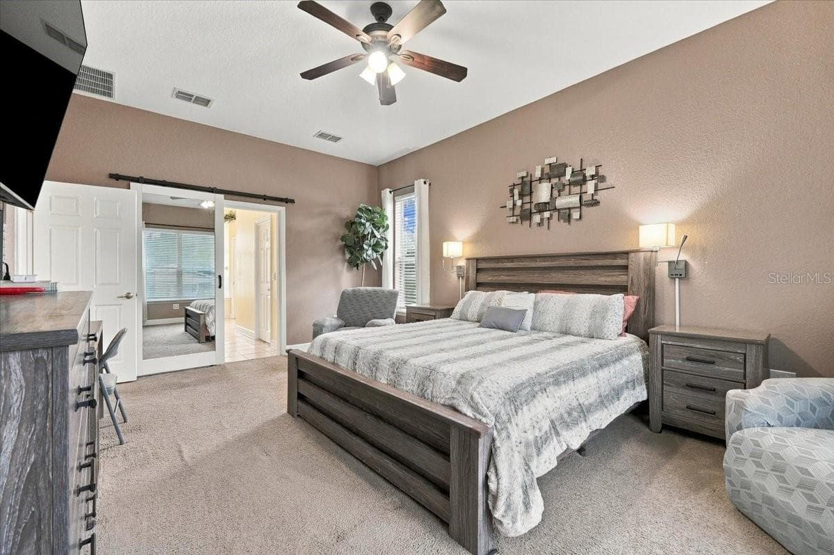 Primary Bedroom - 7380 BENT GRASS DR, WINTER HAVEN
