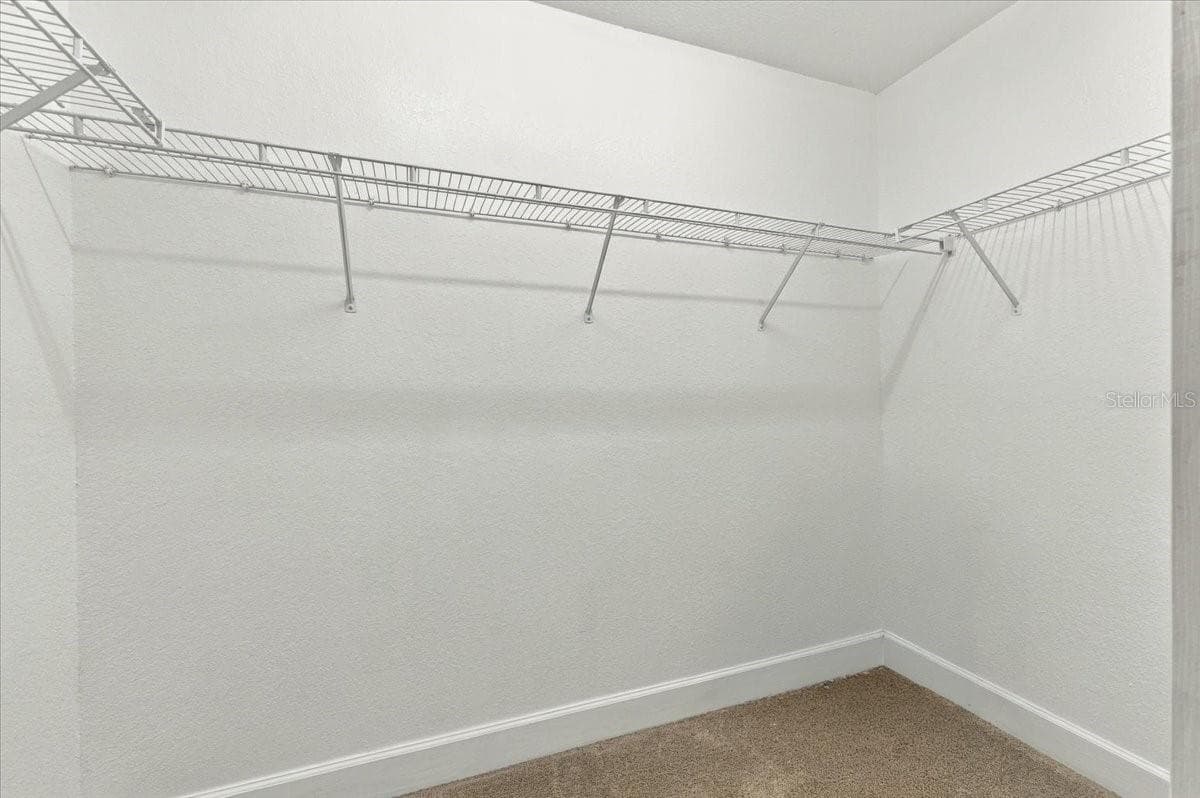 Walk-In-Closet - 7380 BENT GRASS DR, WINTER HAVEN