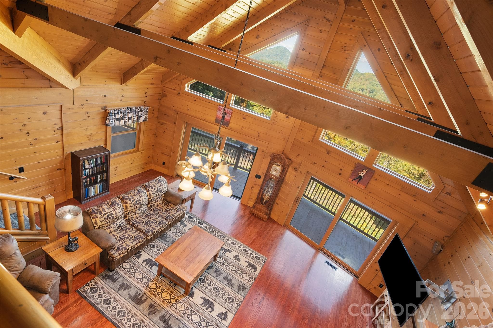 Beautiful architectural details and an open floor plan create an impressive gathering space. - 124 Borges Lane, Waynesville