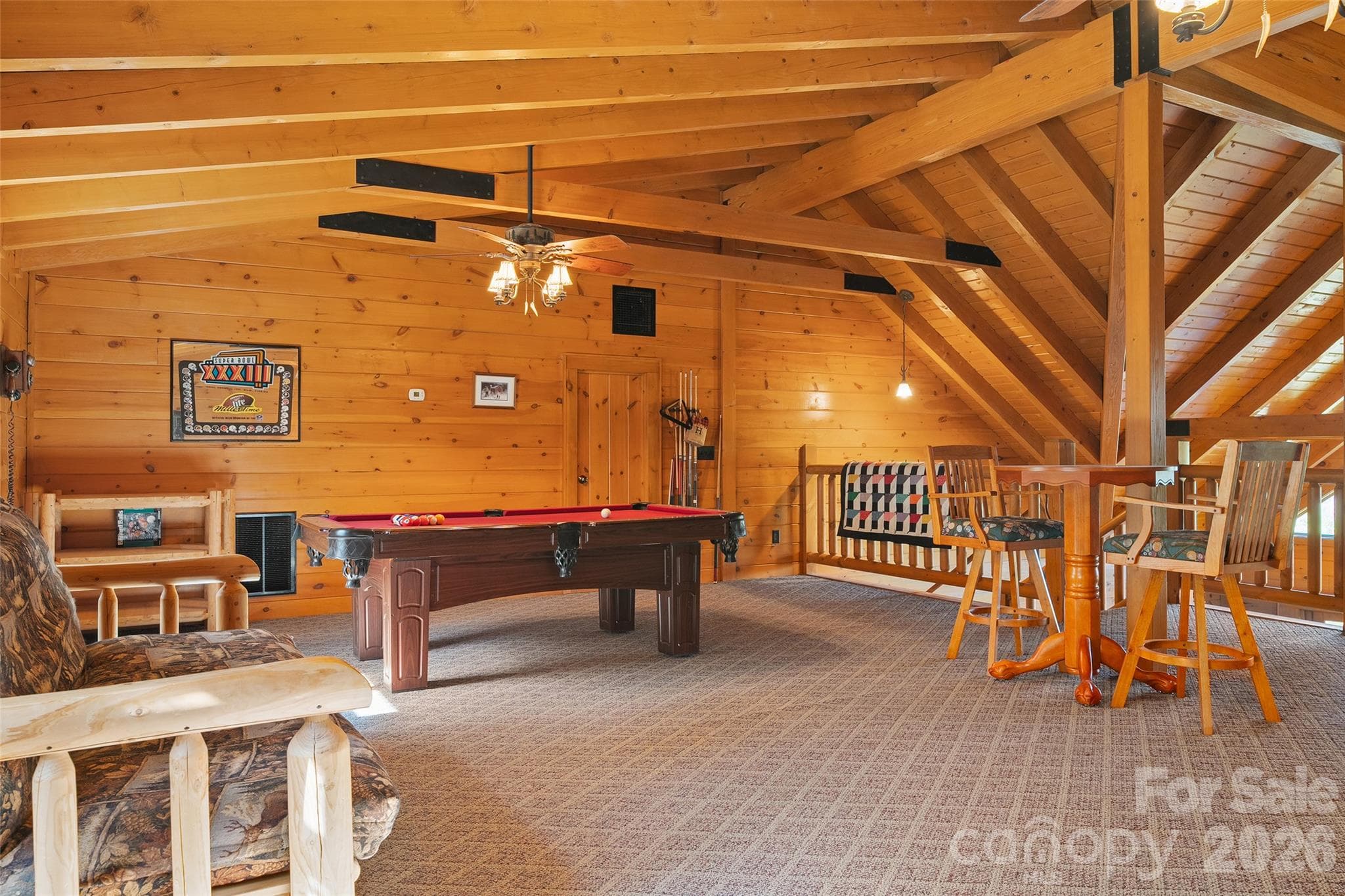 Recreation loft provides plenty of space for games, entertaining, and relaxation. - 124 Borges Lane, Waynesville