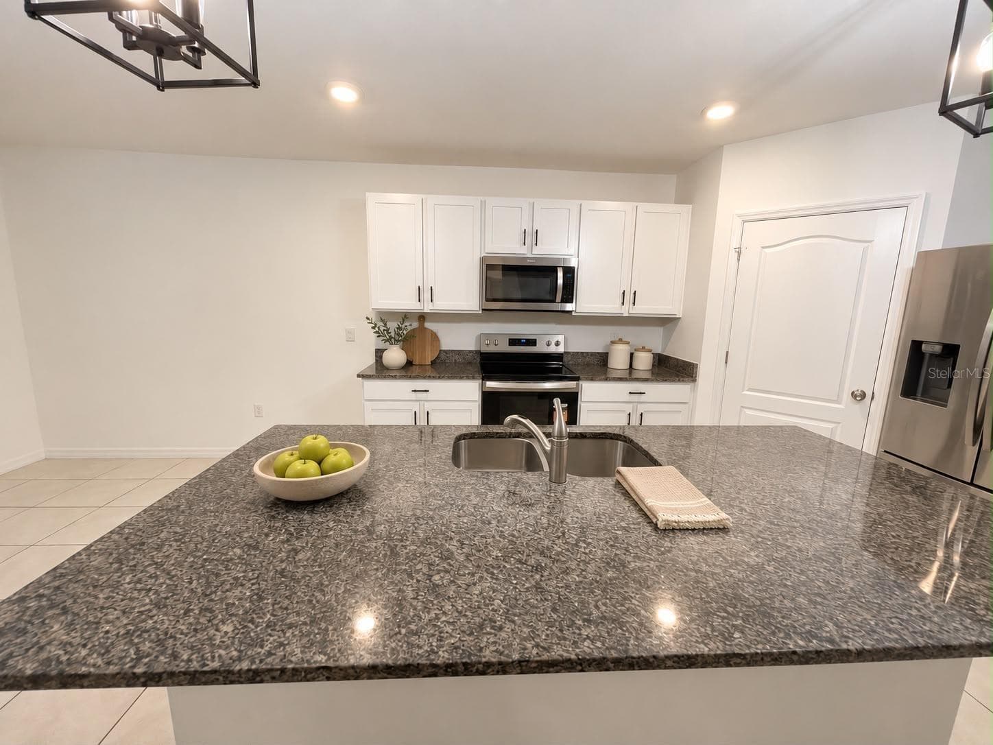 KITCHEN FRONT - 1144 AUGUST SKY DR, DELTONA