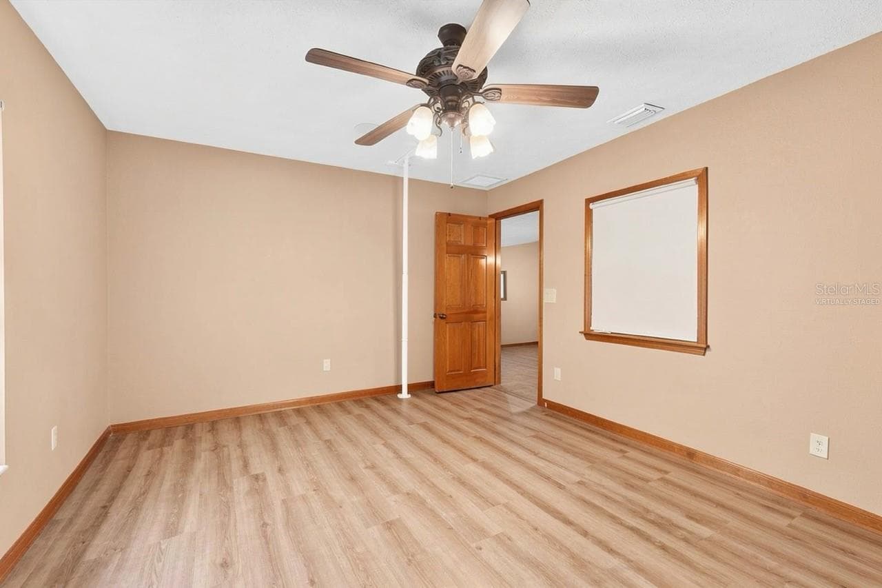 Virtually staged Guest Bedroom 2 - 8699 SE 12TH CT, OCALA