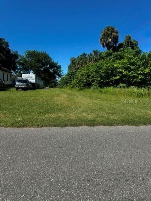 entrance access road to lot - 319 W 4TH ST, APOPKA