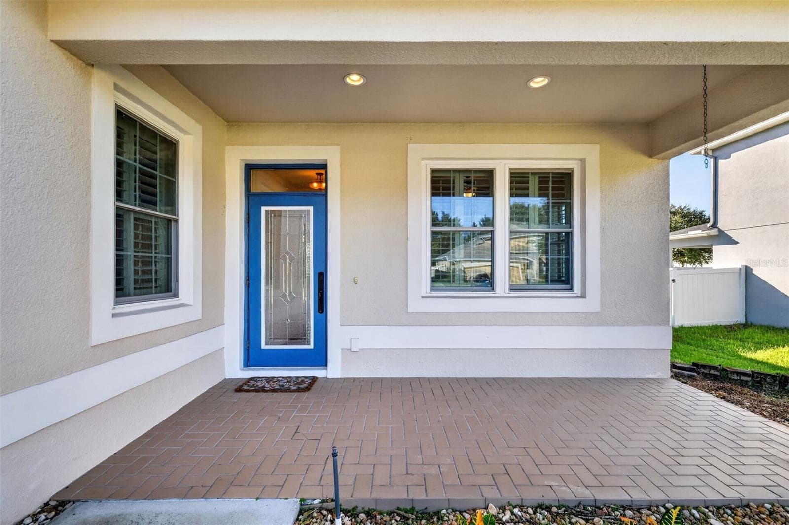 A covered front porch to welcome your guests ~ - 4913 ROYCE DR, MOUNT DORA