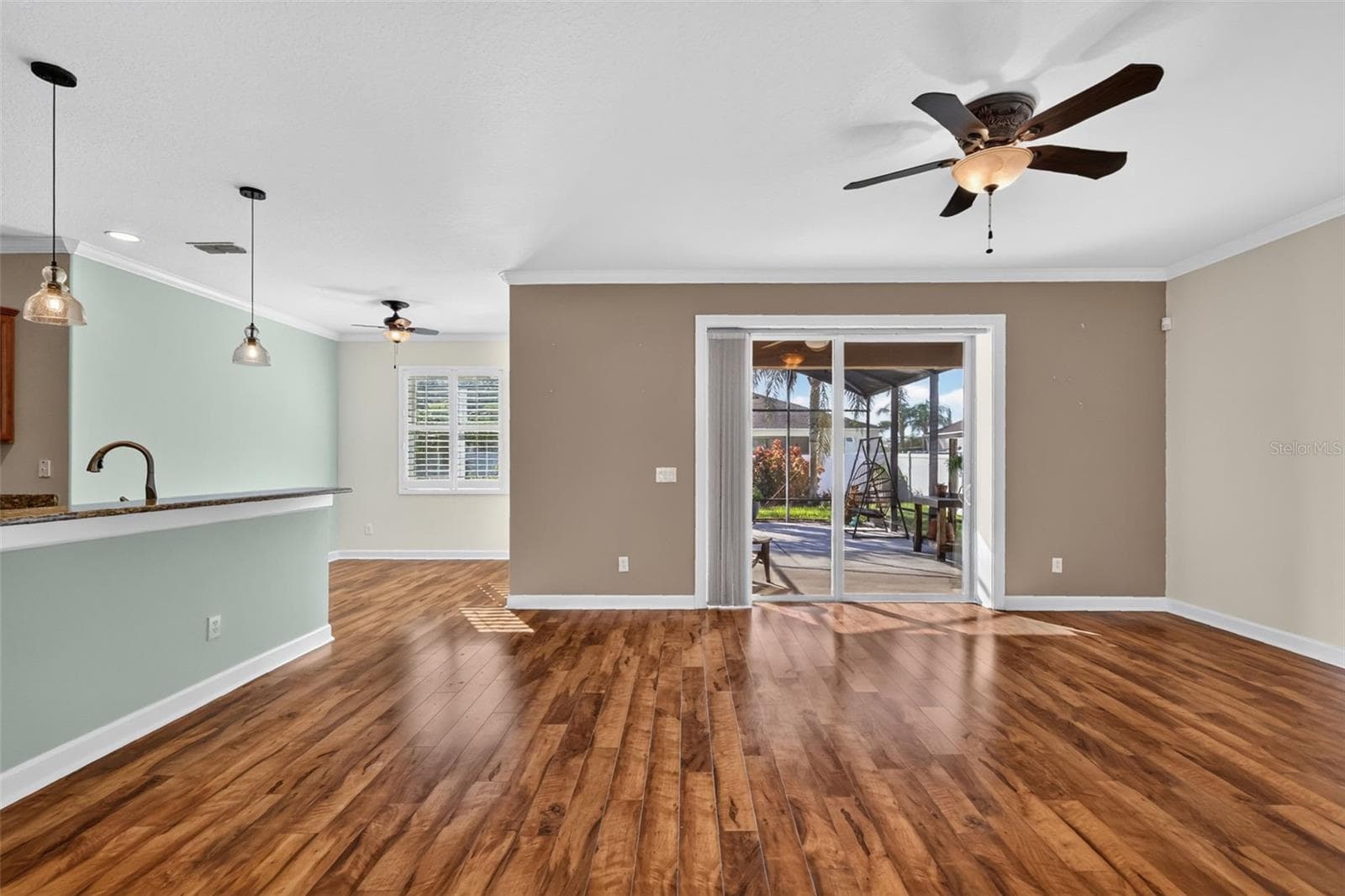 The open view as you enter the family room and heart of the home ~ - 4913 ROYCE DR, MOUNT DORA