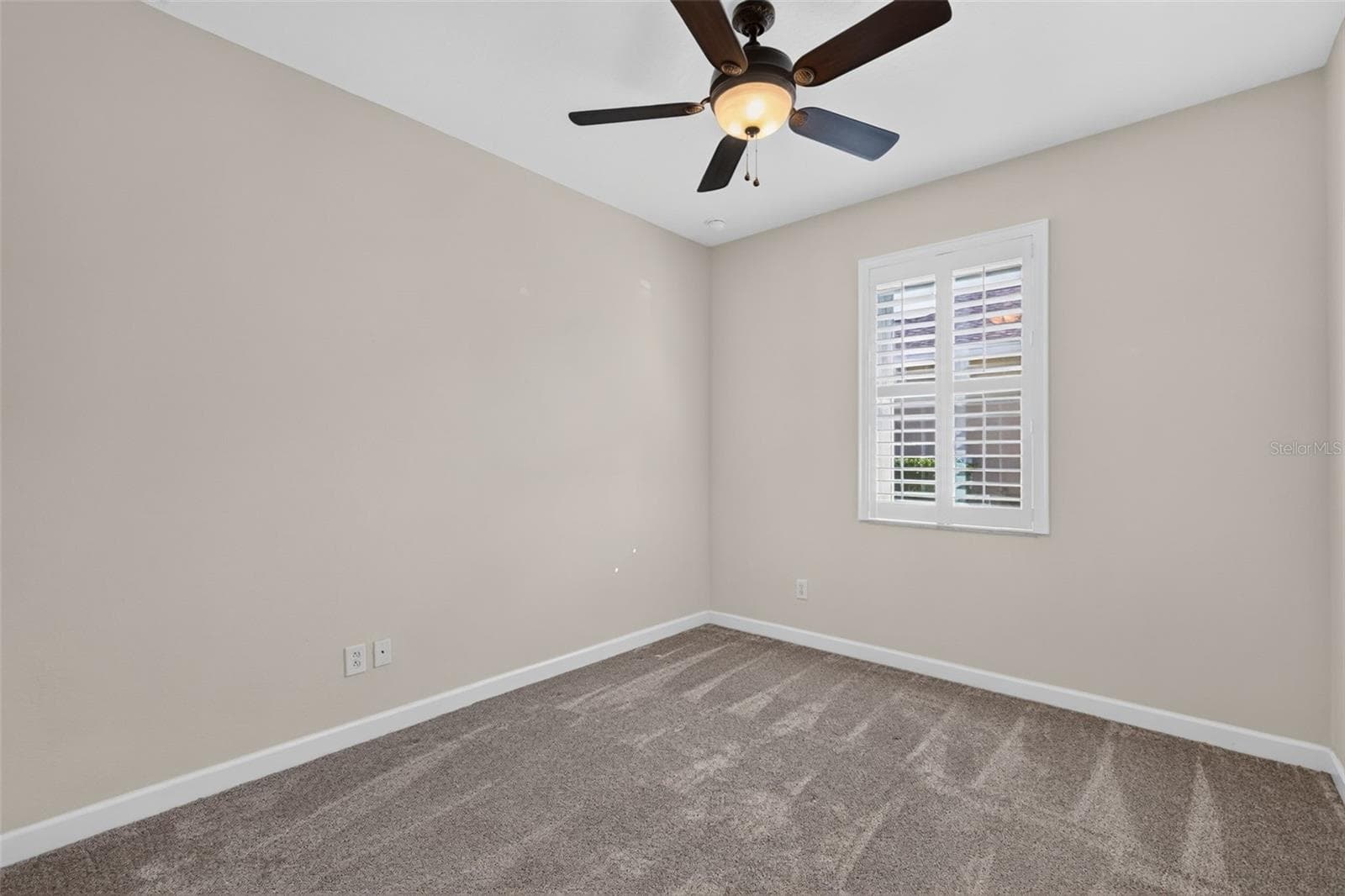 Bedroom 3 is 10'2" x 11'4" and has a wardrobe closet ~ - 4913 ROYCE DR, MOUNT DORA