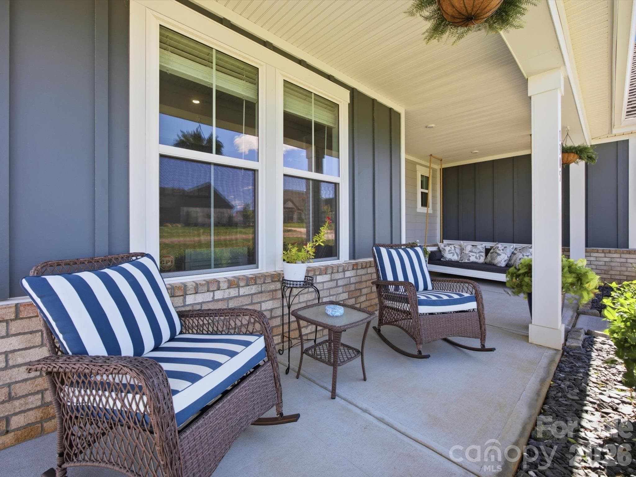 Large covered front porch with lots of seating - 1305 Coppergate Drive, Salisbury