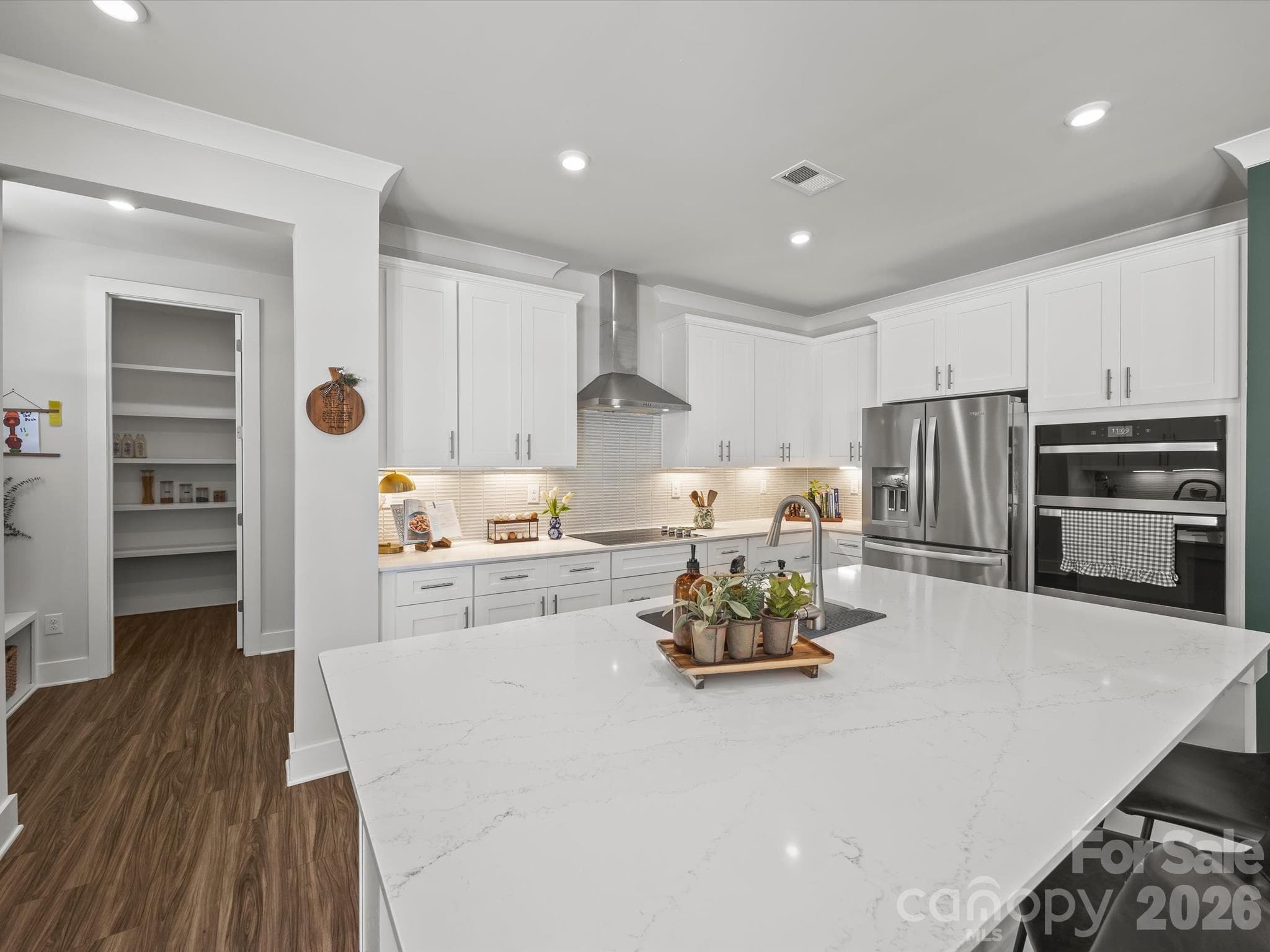Walk in pantry with wood shelving right off kitchen - 1305 Coppergate Drive, Salisbury