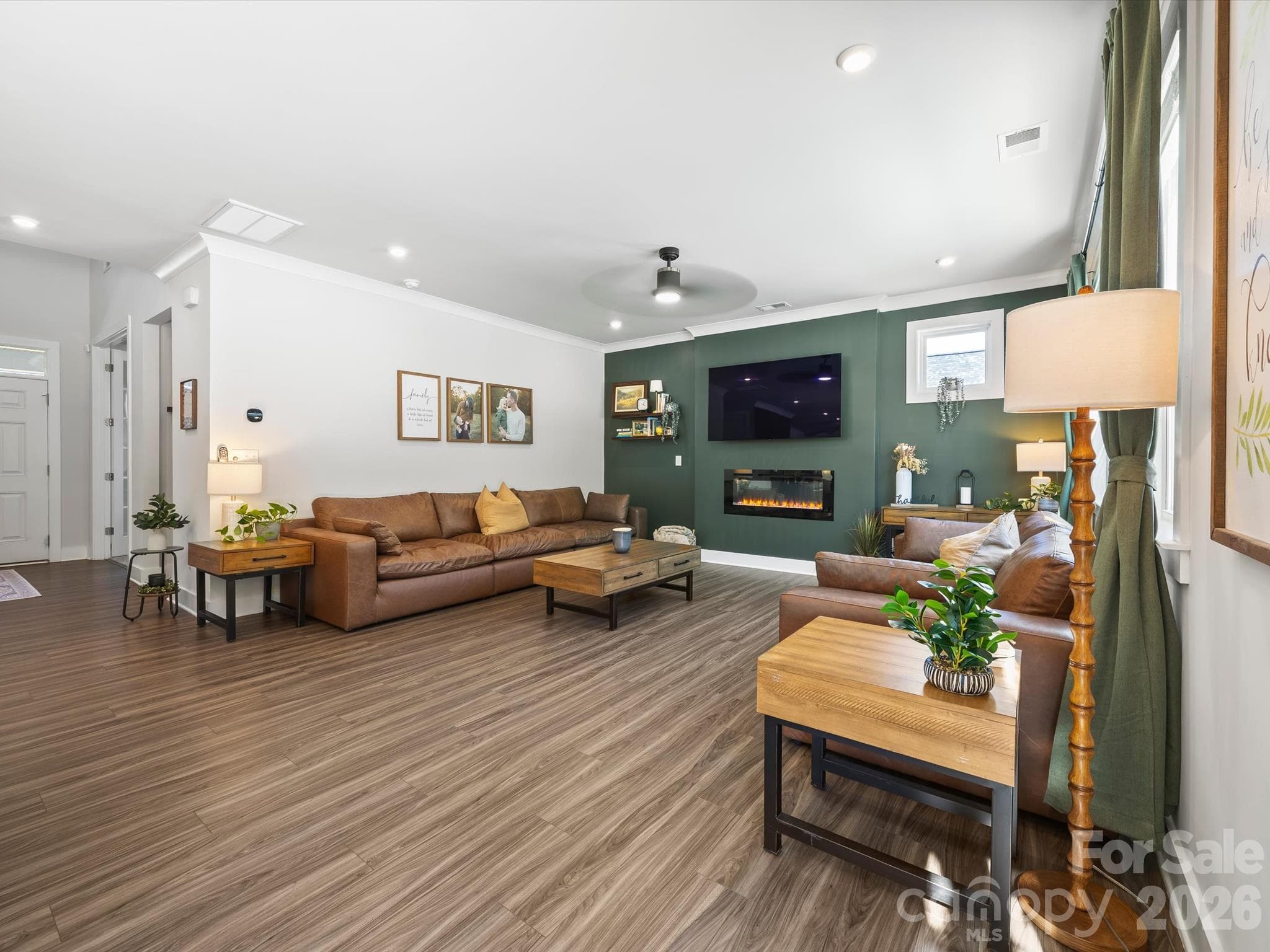 Living area with electric fireplace - 1305 Coppergate Drive, Salisbury