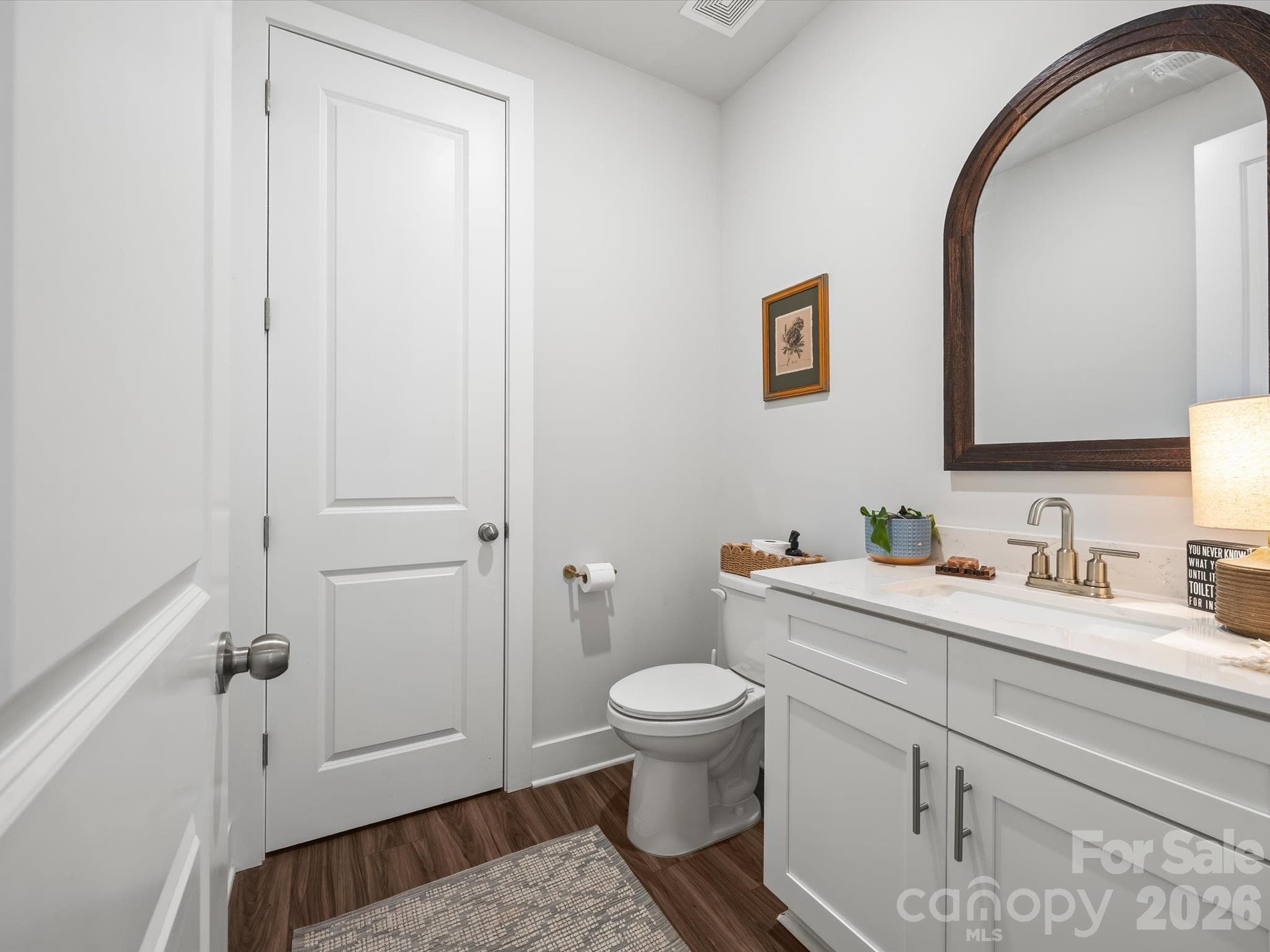 Main level half bath with large storage closet - 1305 Coppergate Drive, Salisbury