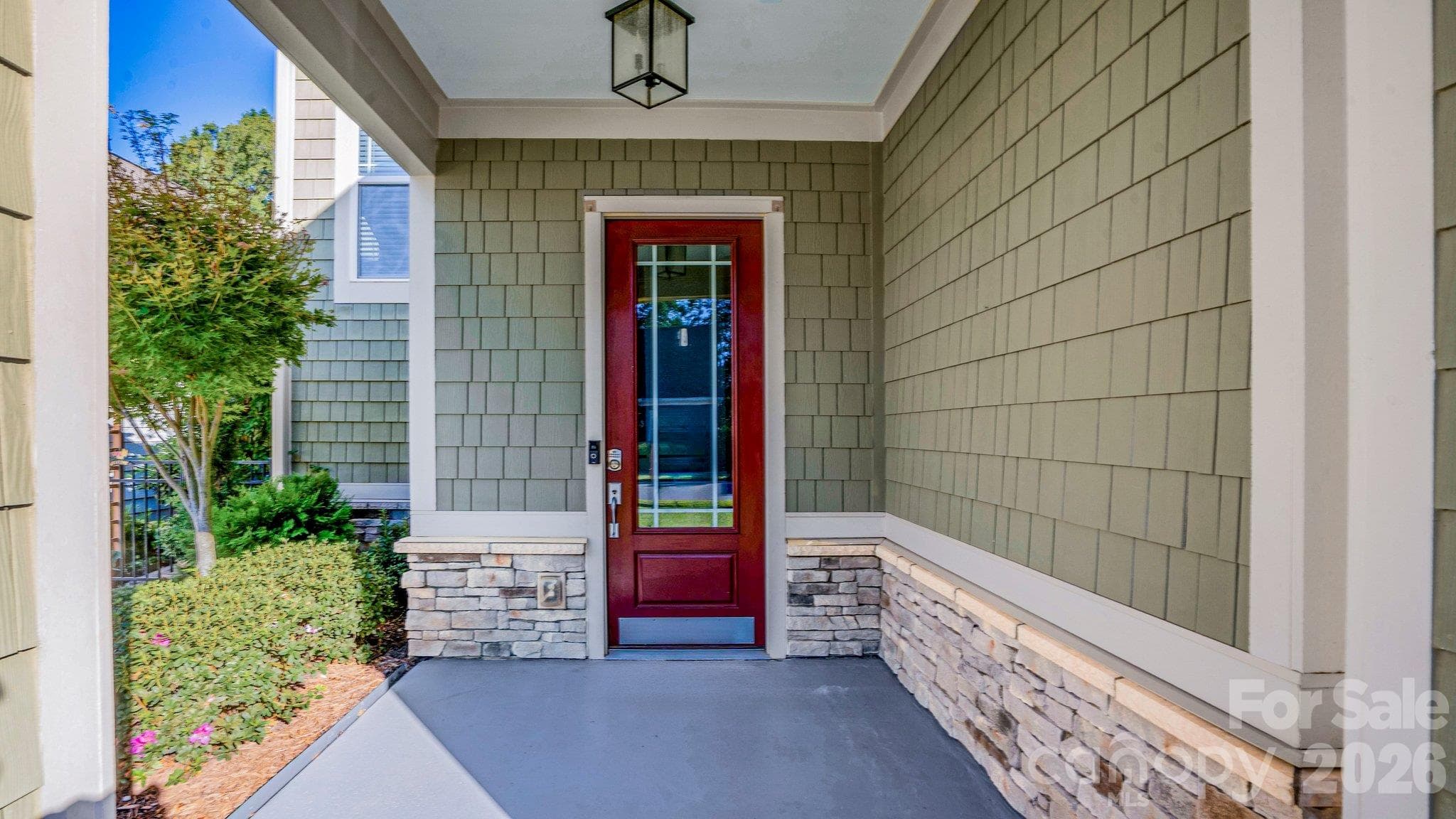 Inviting covered front porch with stone accents - 2050 Laney Pond Road, Matthews