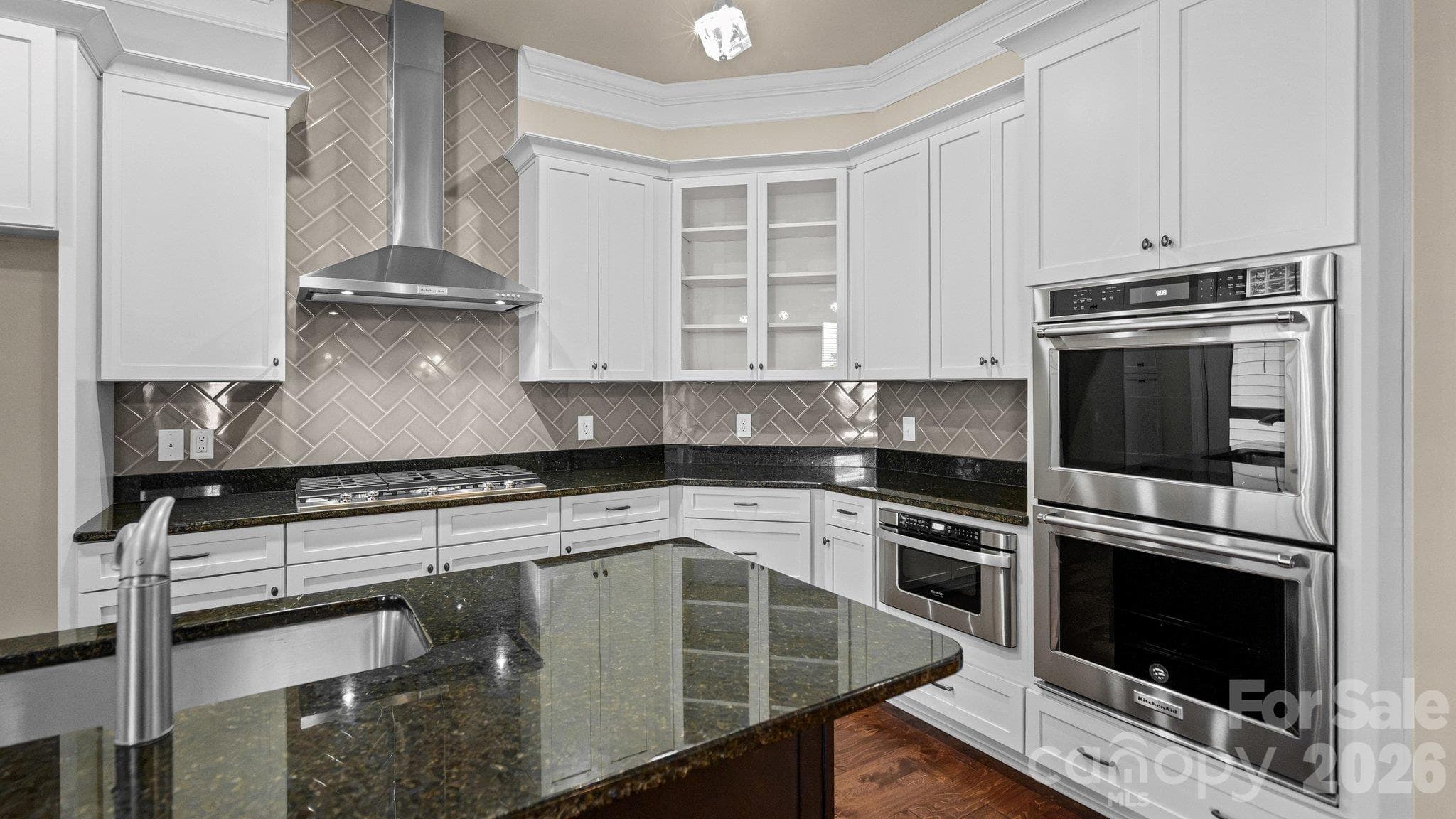 Stainless double wall ovens and vented range hood - 2050 Laney Pond Road, Matthews