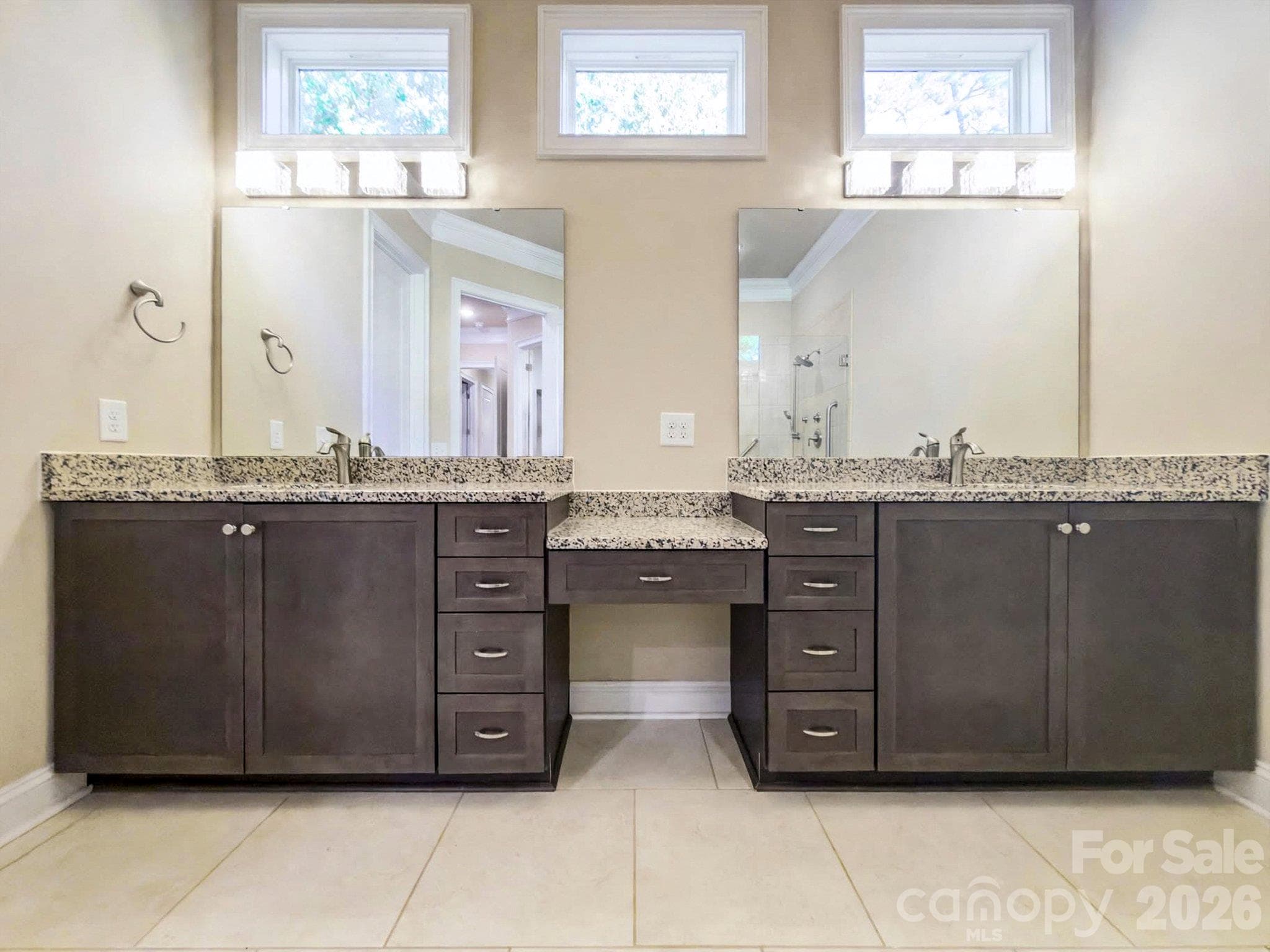 Primary bath with dual vanities and makeup counter - 2050 Laney Pond Road, Matthews