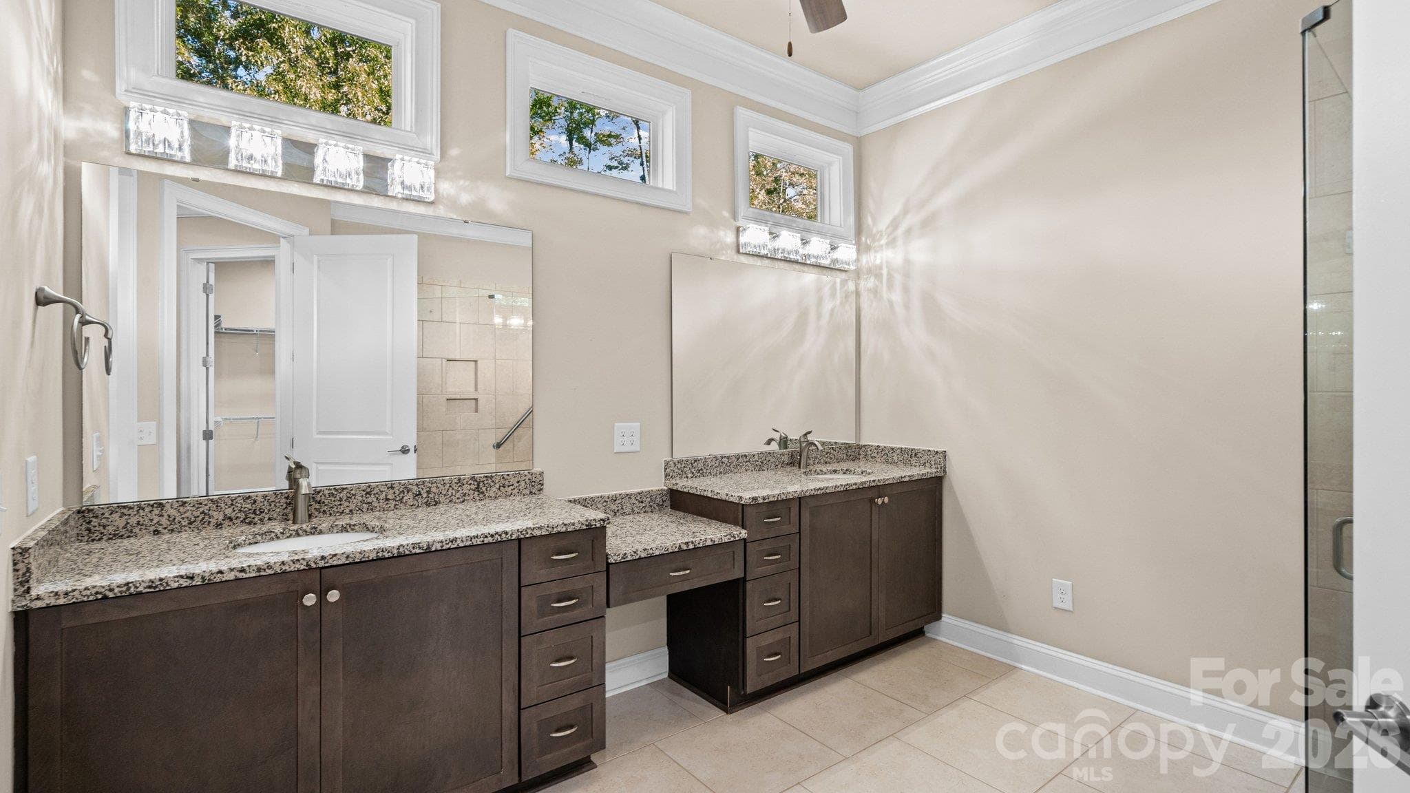 Primary bath with granite counters and plenty of storage - 2050 Laney Pond Road, Matthews