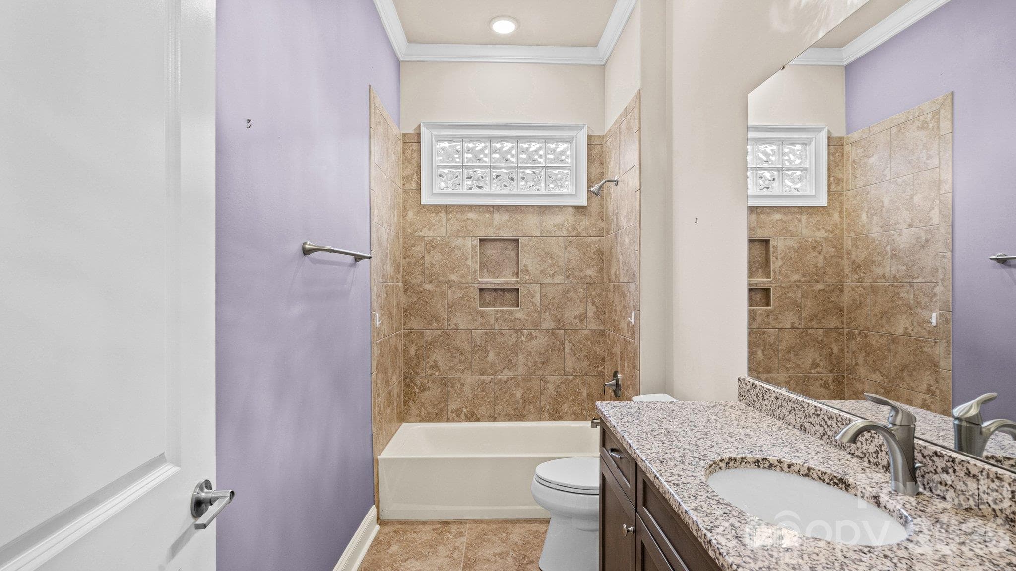 Full bath with tub/shower combo and tile surround - 2050 Laney Pond Road, Matthews