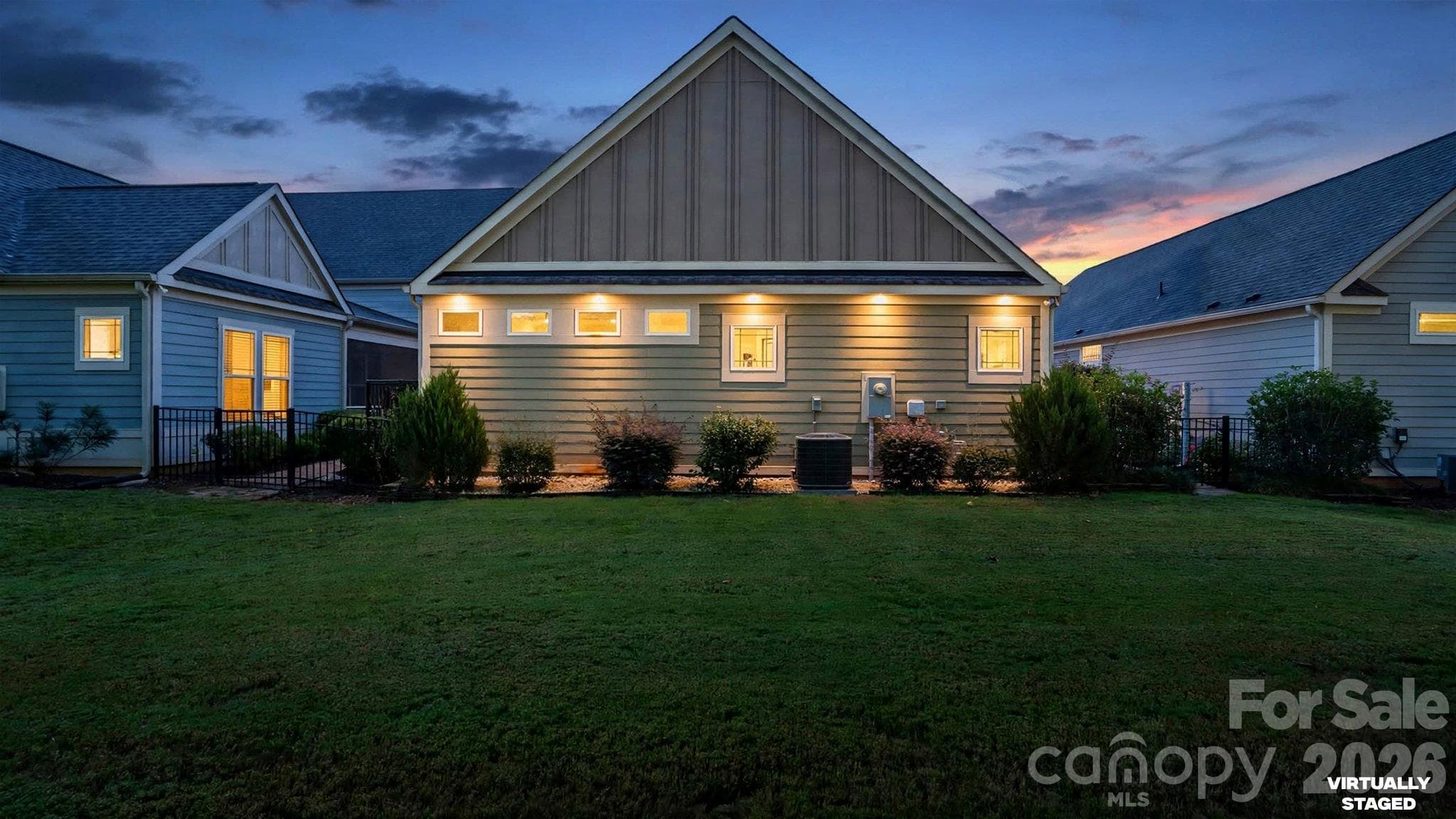 Rear exterior at twilight - 2050 Laney Pond Road, Matthews