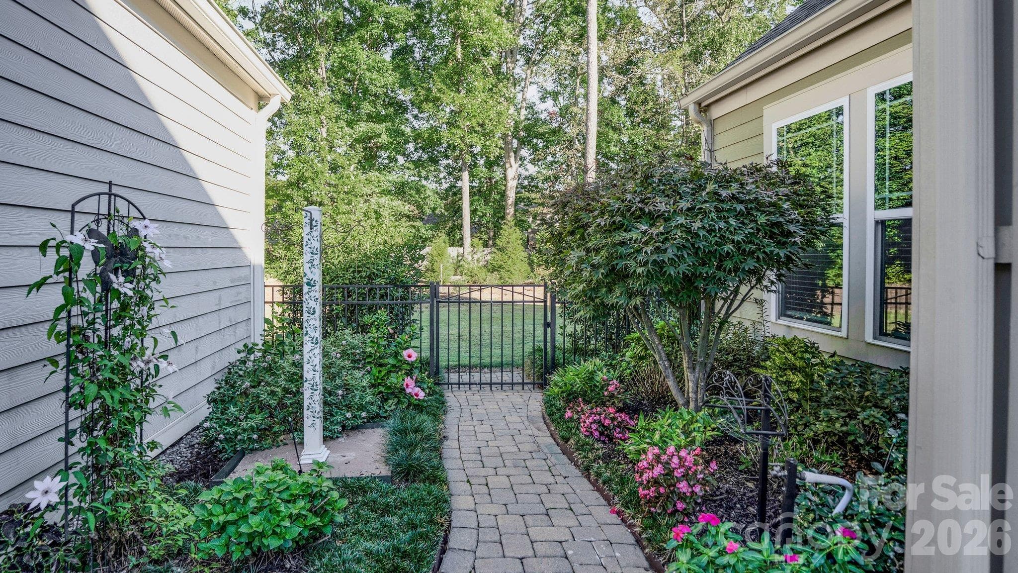 Beautiful garden path along the side of the home - 2050 Laney Pond Road, Matthews