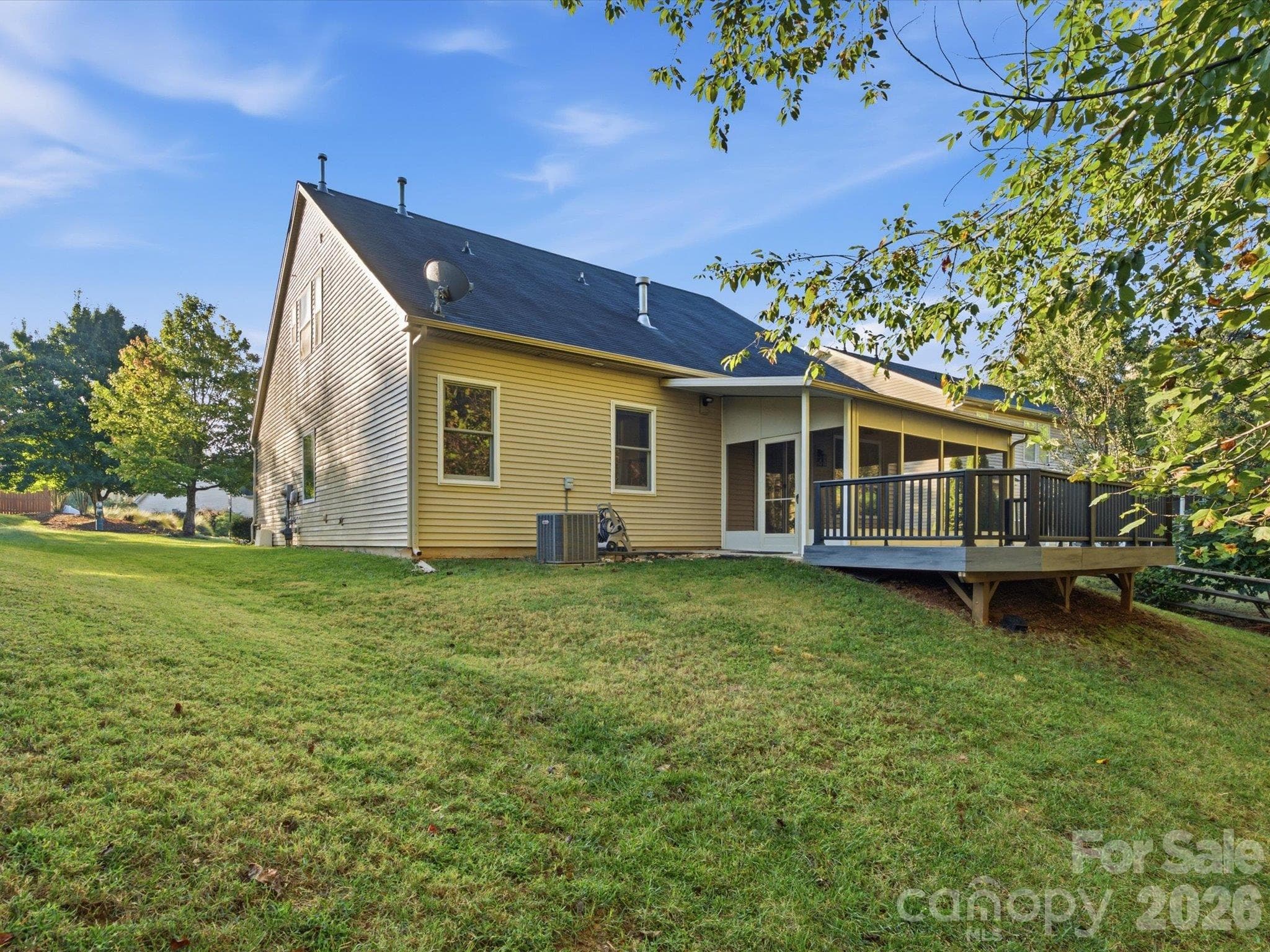 Back of home showing deck and screened porch - 15110 Reminisce Lane, Charlotte