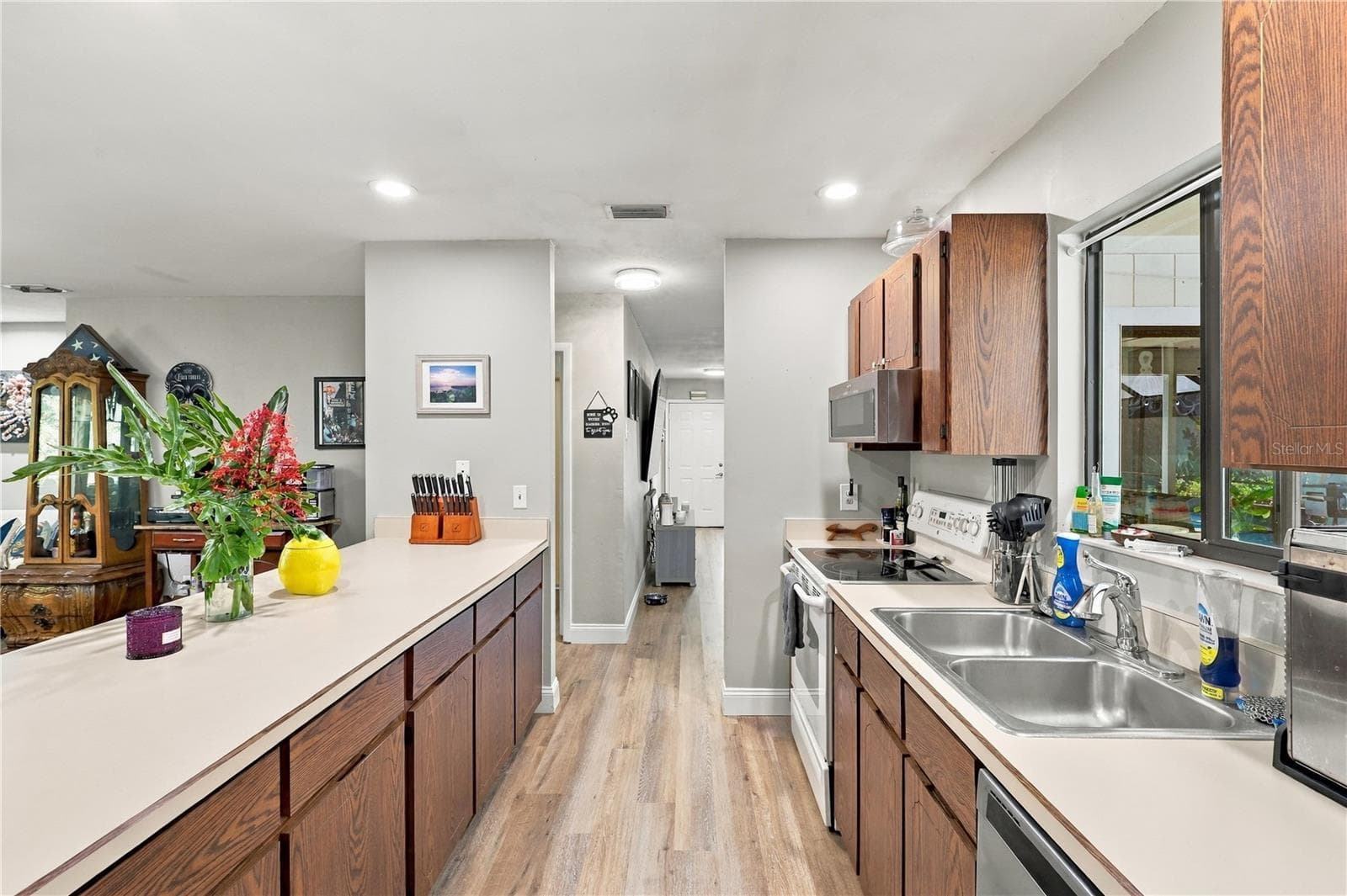 View from Refrigerator to Front Door, Another Living/Dining Area is on the Left! - 92 FOSTER LN, PALM COAST