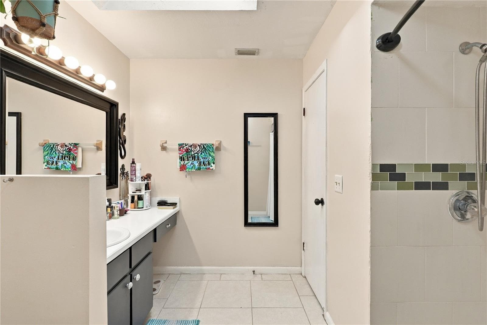 Master Bathroom, Stand-Up Shower, 1 Sink, Large Mirror and Small Vanity Area. - 92 FOSTER LN, PALM COAST