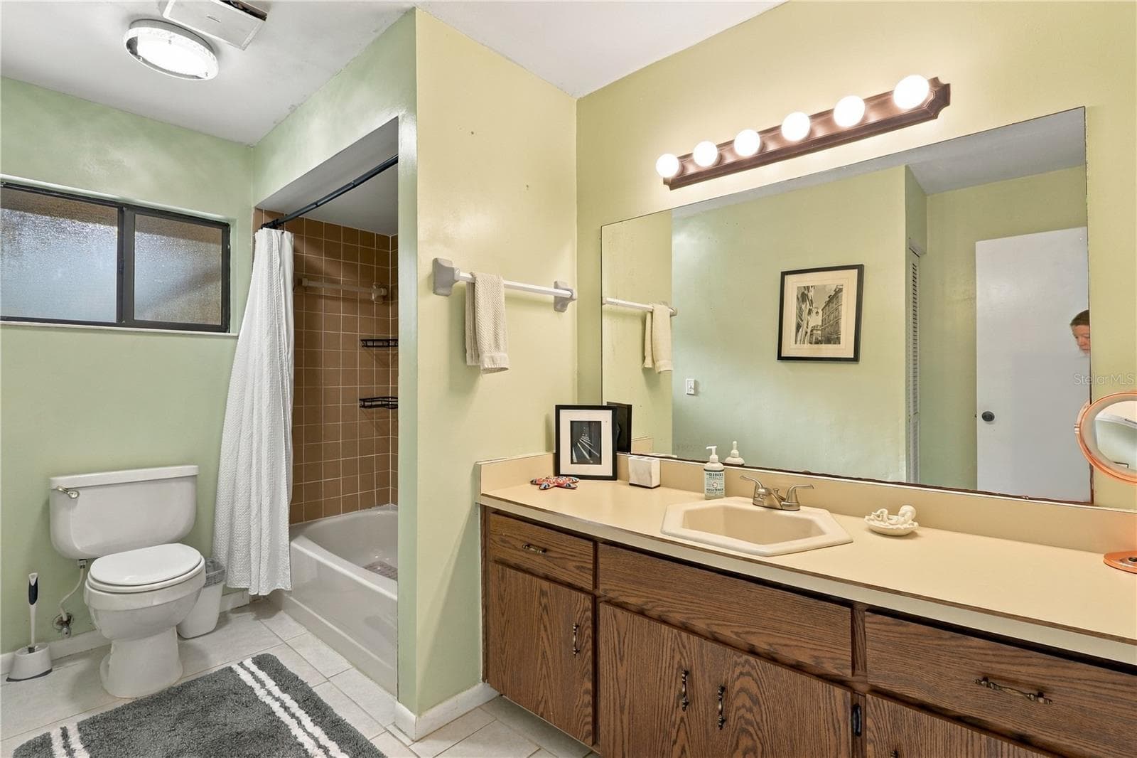 Second Bathroom, Window to the Back Patio & Pool, Tub/Shower Combo, Linen Closet Inside, Lots of Counter Space! - 92 FOSTER LN, PALM COAST