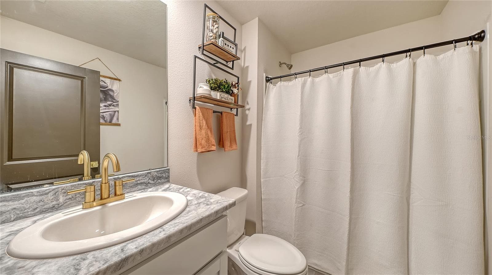 Downstairs Full Bathroom- Shower/ Tub Combo - 10016 BIG MARSH TER, PARRISH