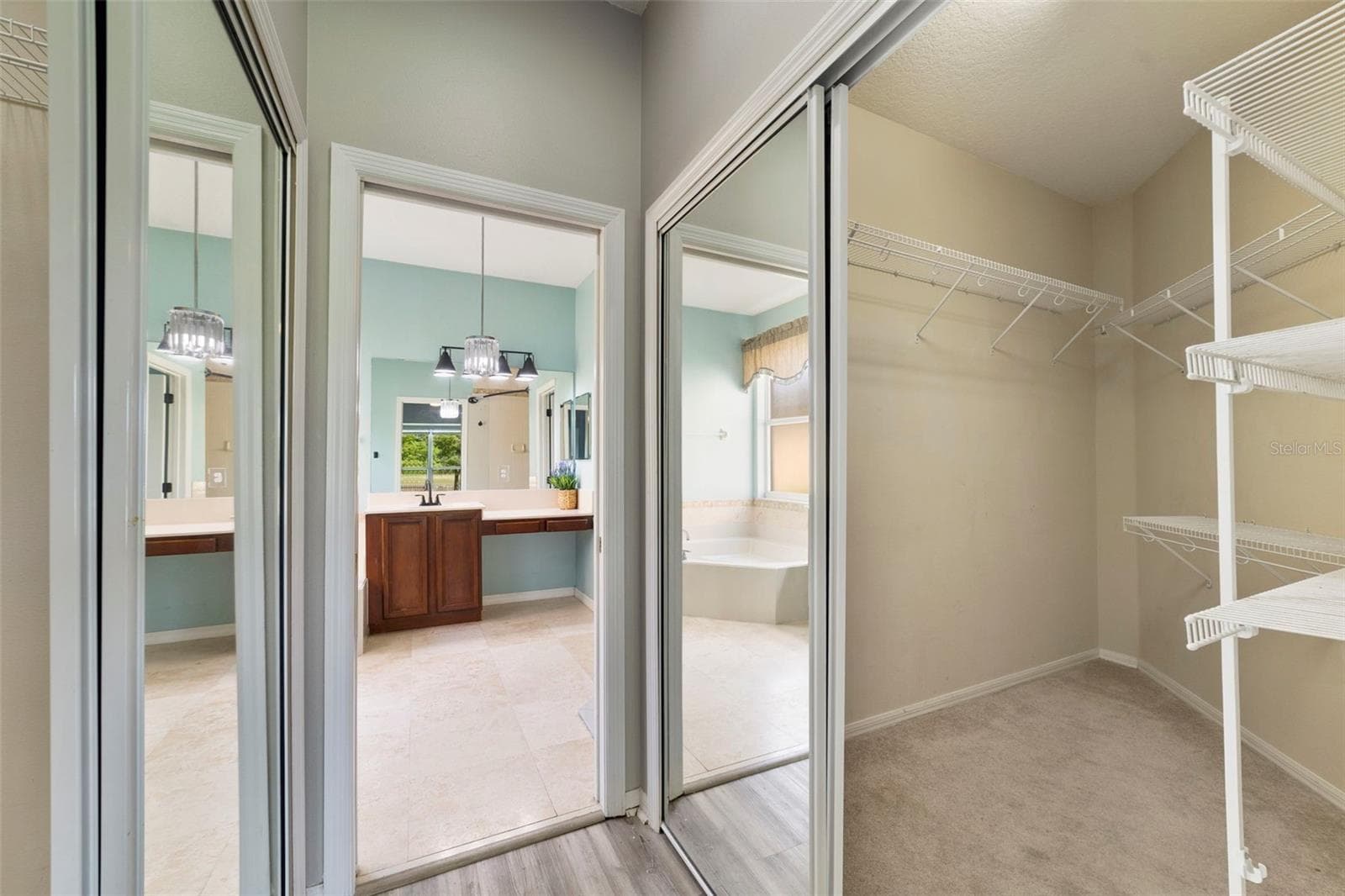 TWO WALK-IN CLOSETS in the Primary Suite provide generous storage. - 1557 AMARYLLIS CIR, ORLANDO