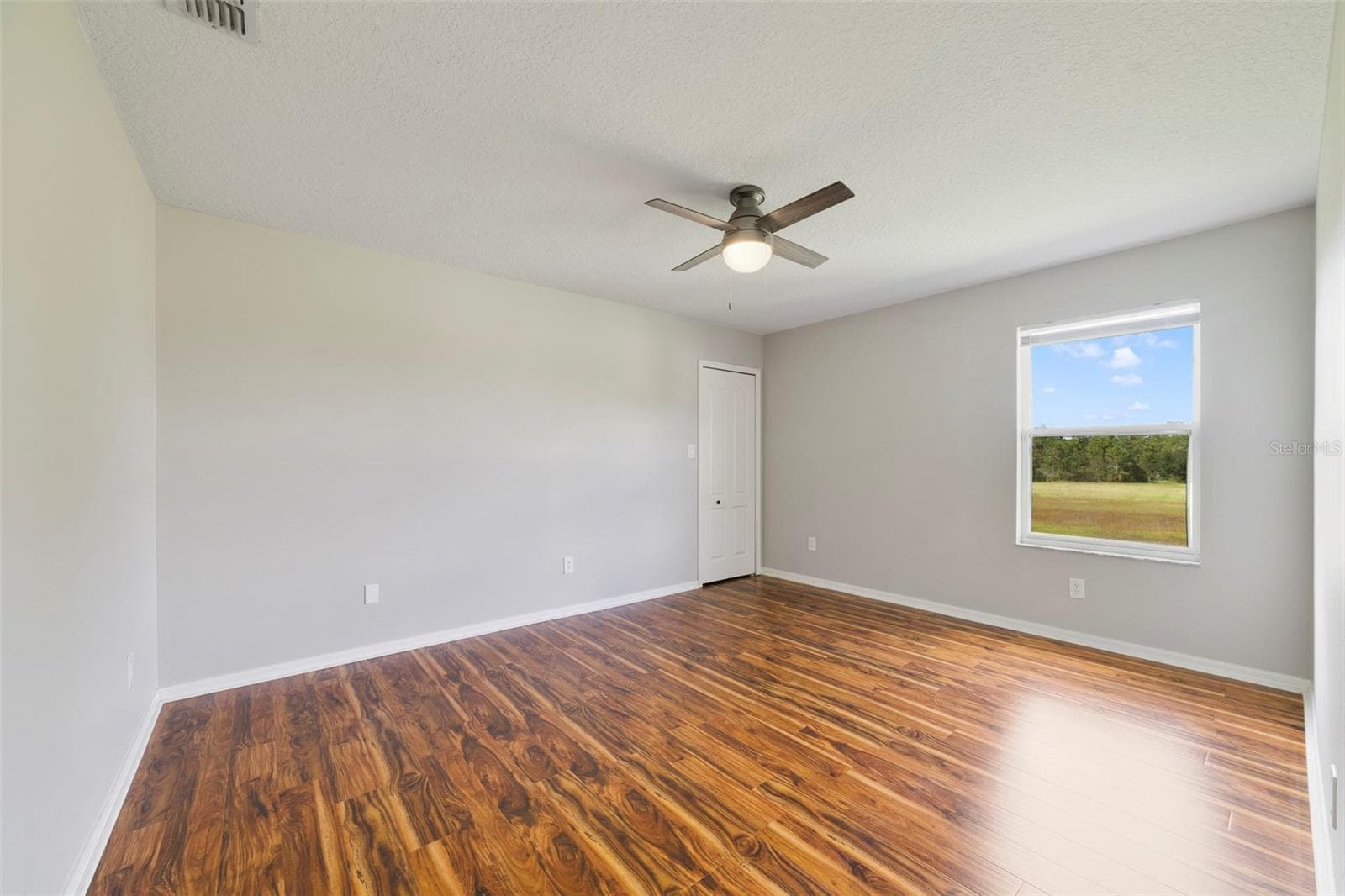Three additional Bedrooms offer room for family and guests. Bedroom 3 - 1557 AMARYLLIS CIR, ORLANDO