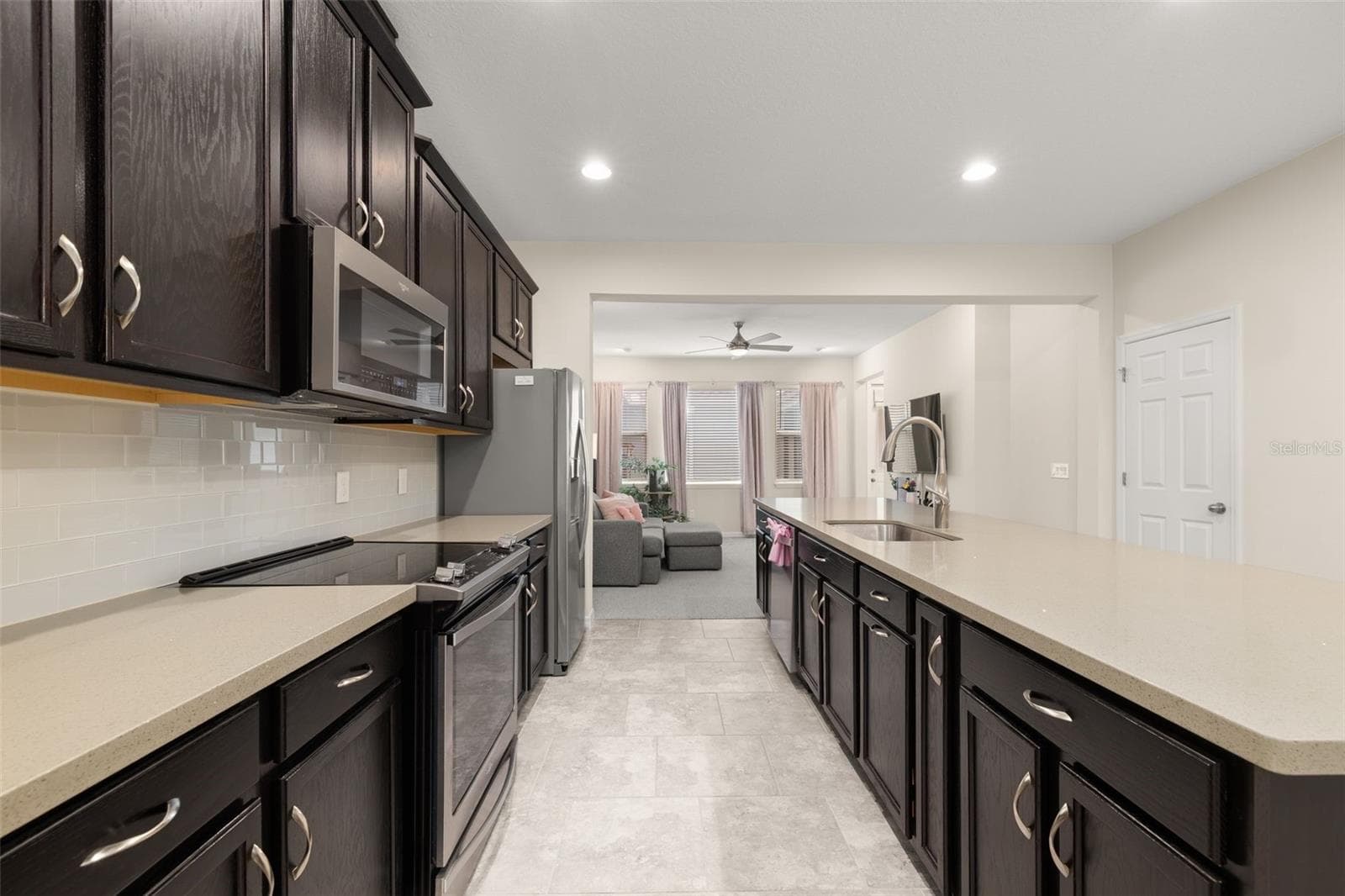 Kitchen loaded with counterspace for food prep and cabinetry for storage - 8067 GLENLLOYD AVE, WINTER GARDEN