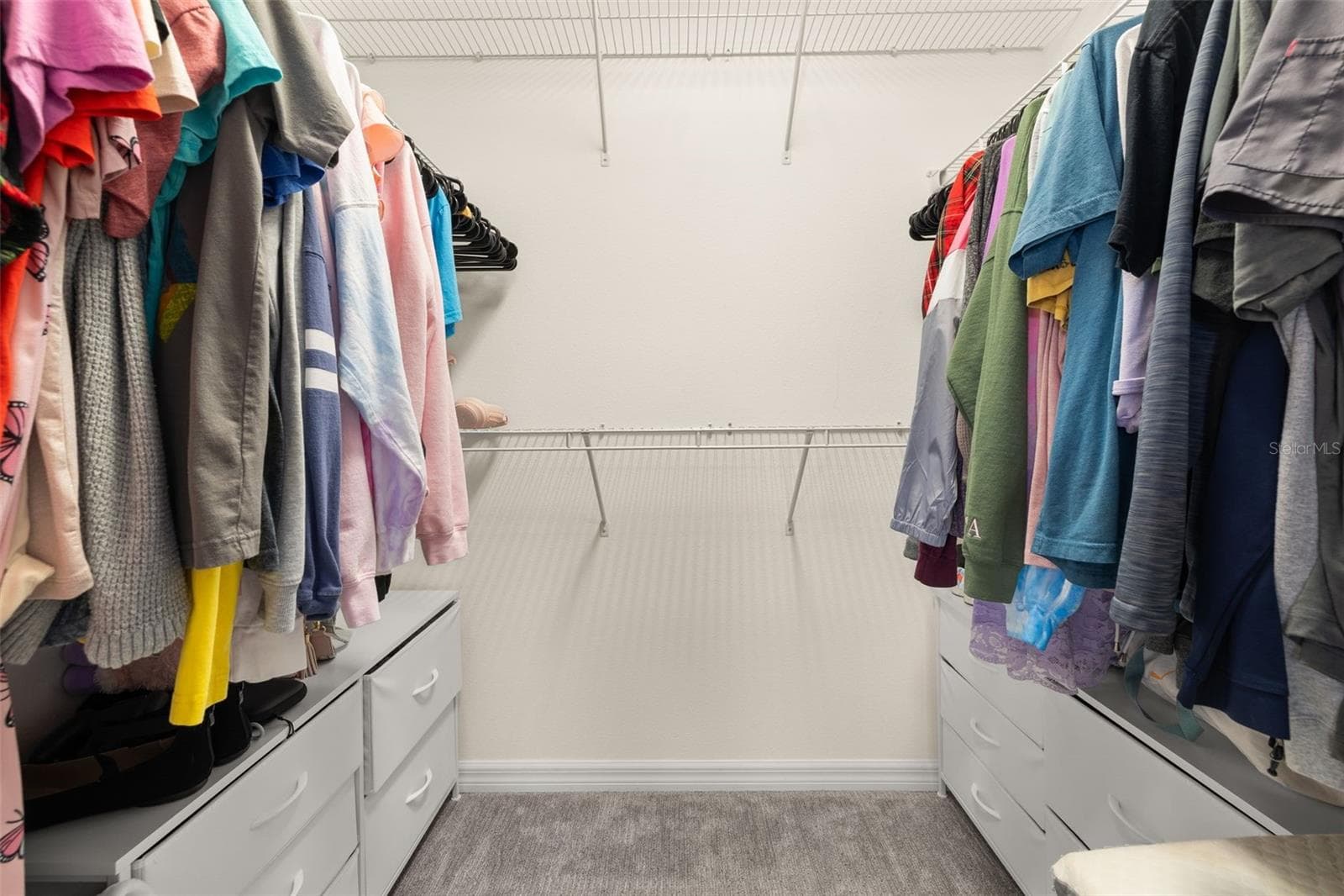 Walk-in closet in the primary bedroom - 8067 GLENLLOYD AVE, WINTER GARDEN