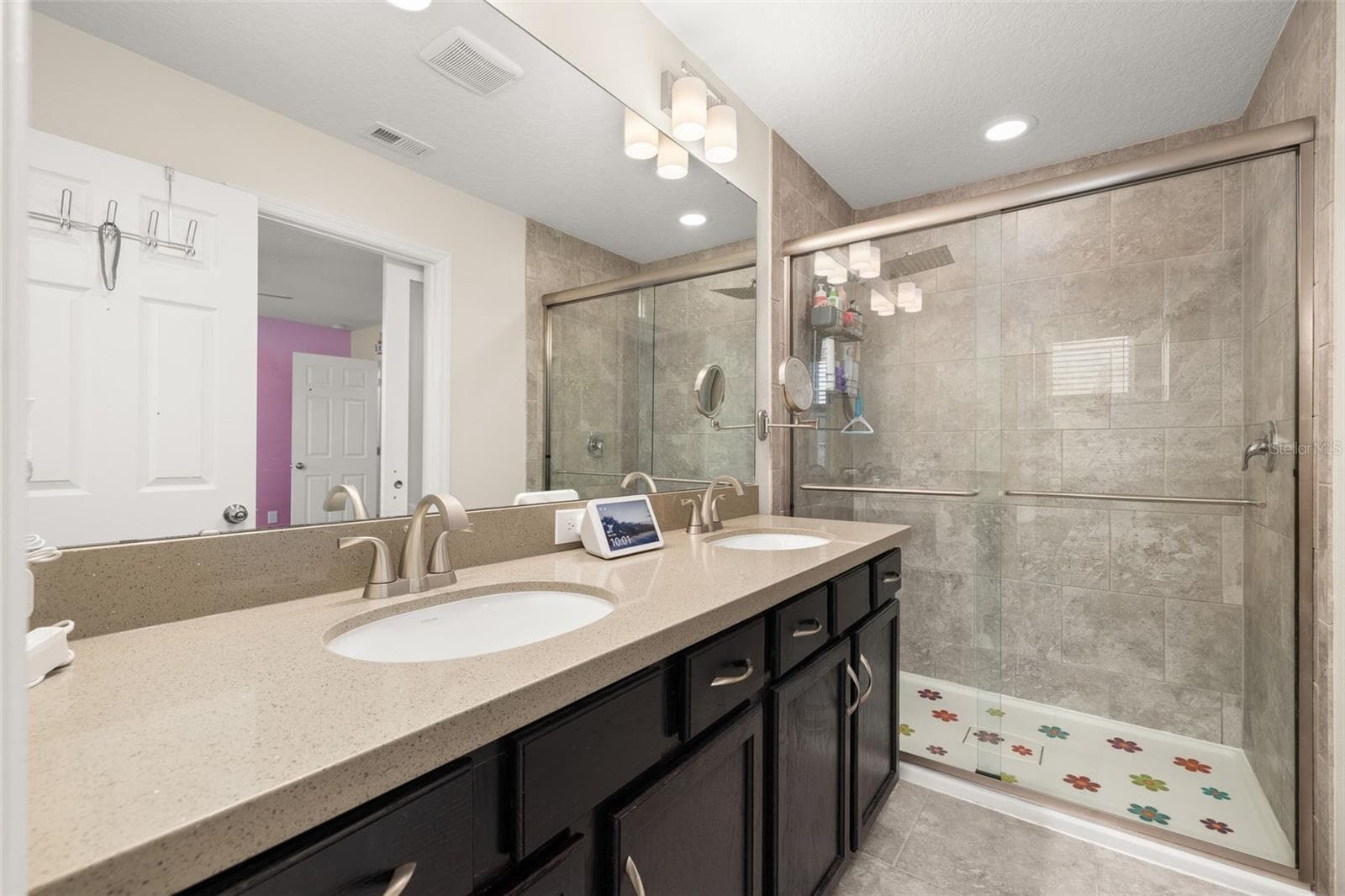 Primary bathroom with a brand new shower enclosure and large vanity - 8067 GLENLLOYD AVE, WINTER GARDEN