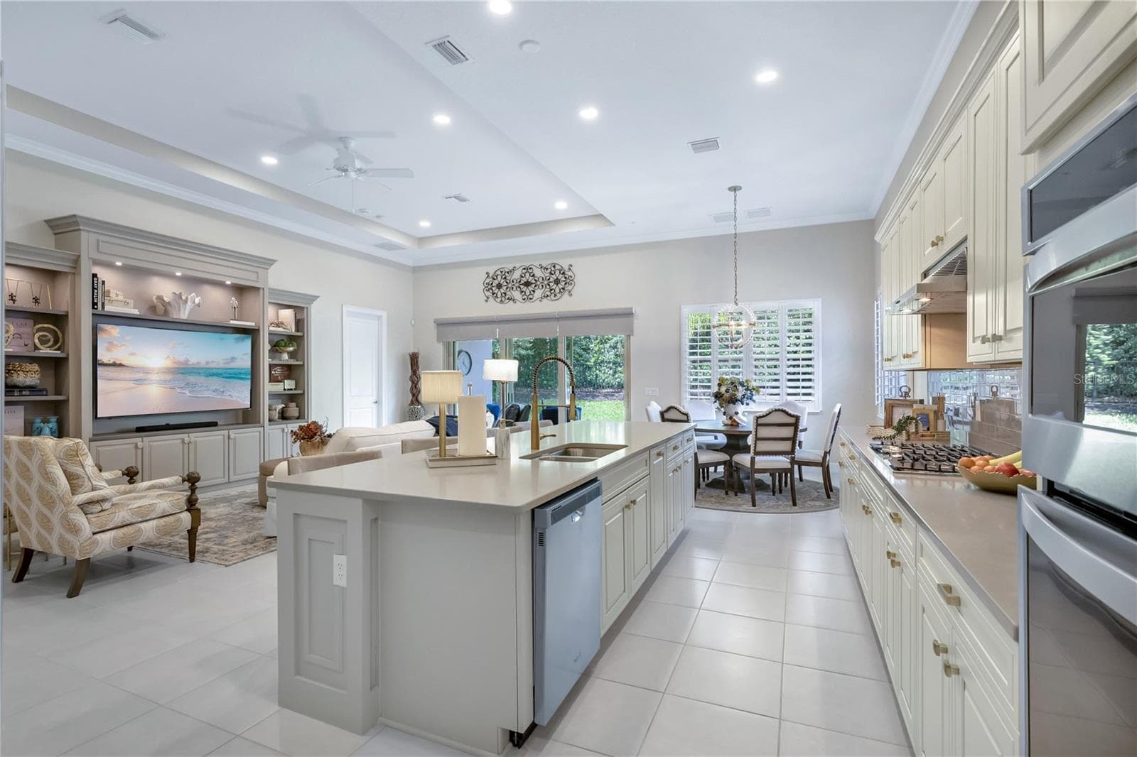 Beautifully appointed kitchen featuring generous counter space and stylish finishes. - 15749 CUTTER SAIL PL, WINTER GARDEN